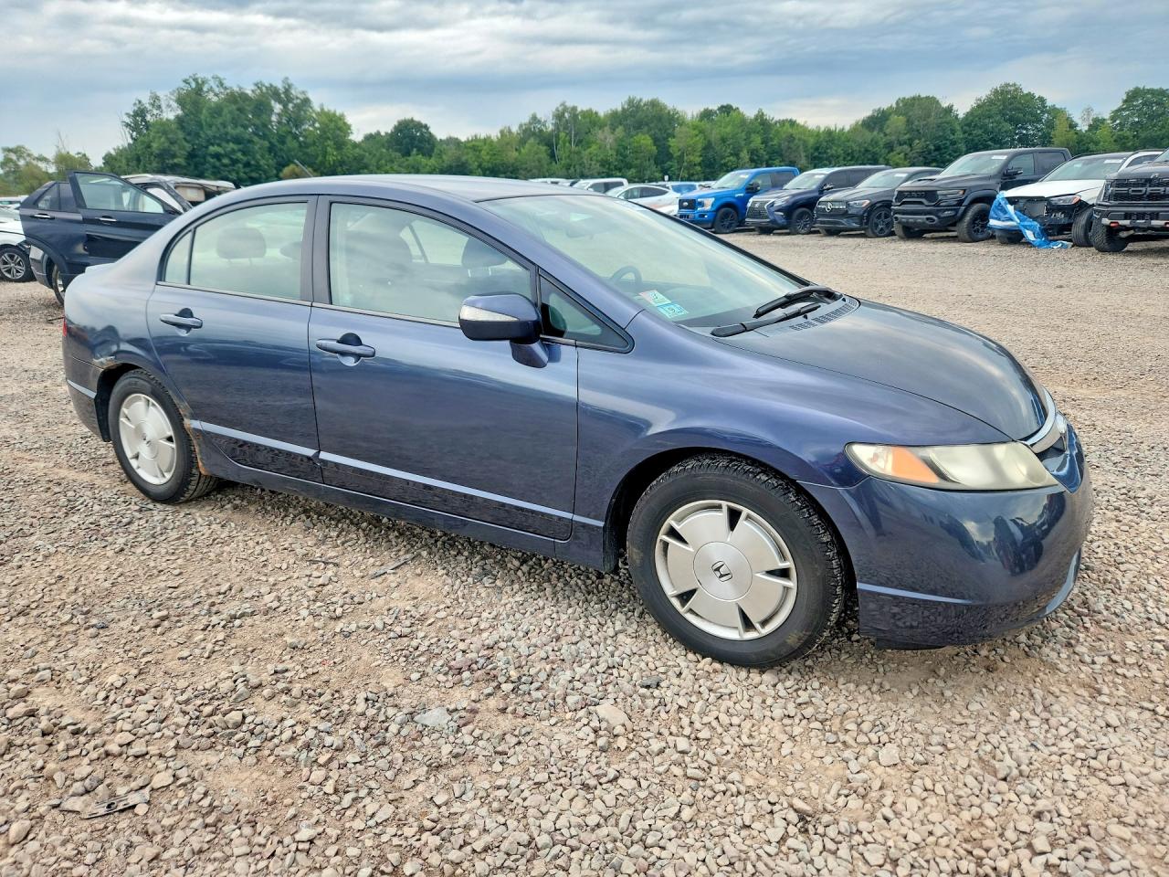 2006 Honda Civic Hybrid Blue vin: JHMFA36266S028026