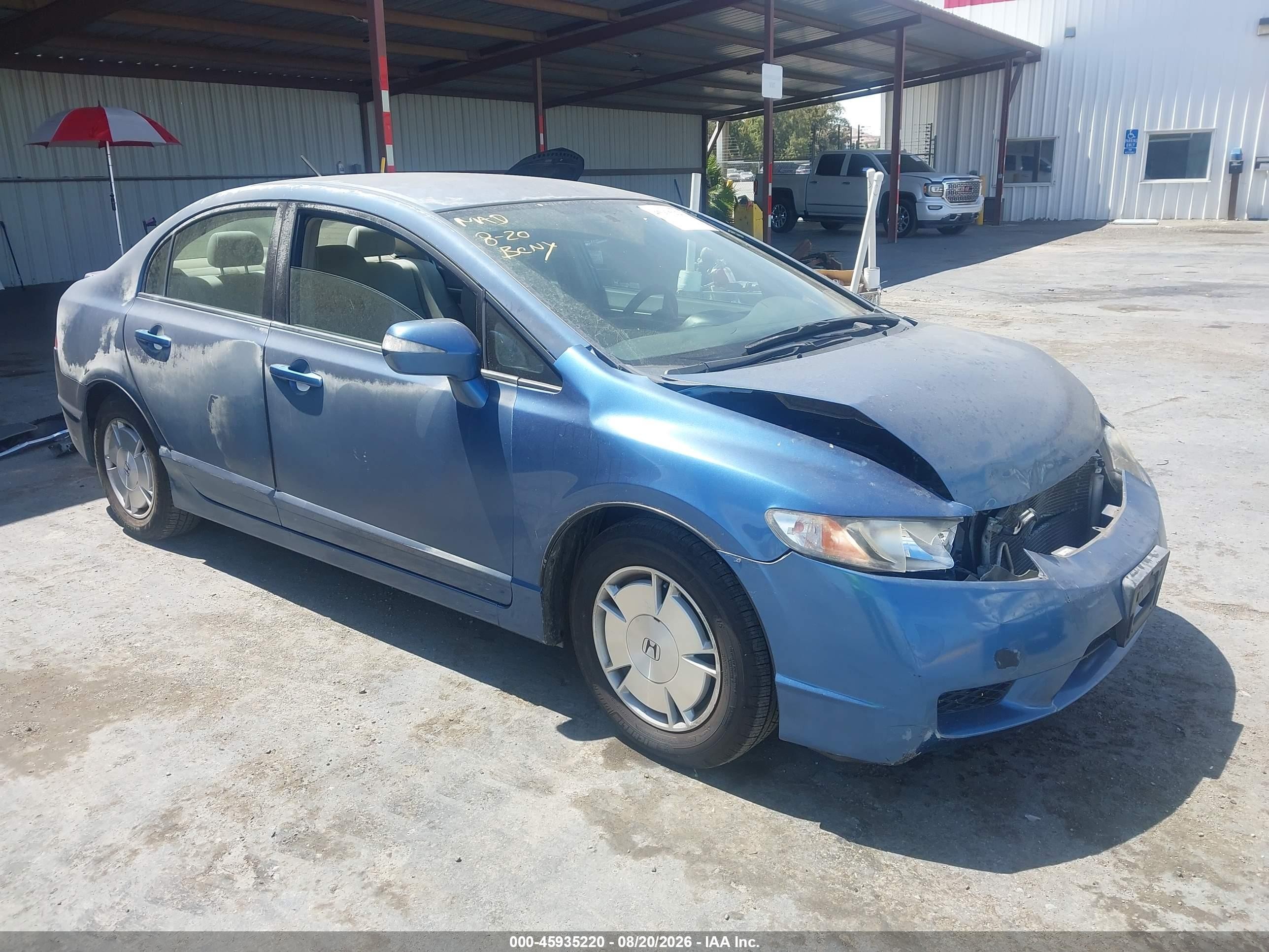 2009 Honda Civic Hybrid   Light Blue vin: JHMFA36269S002806
