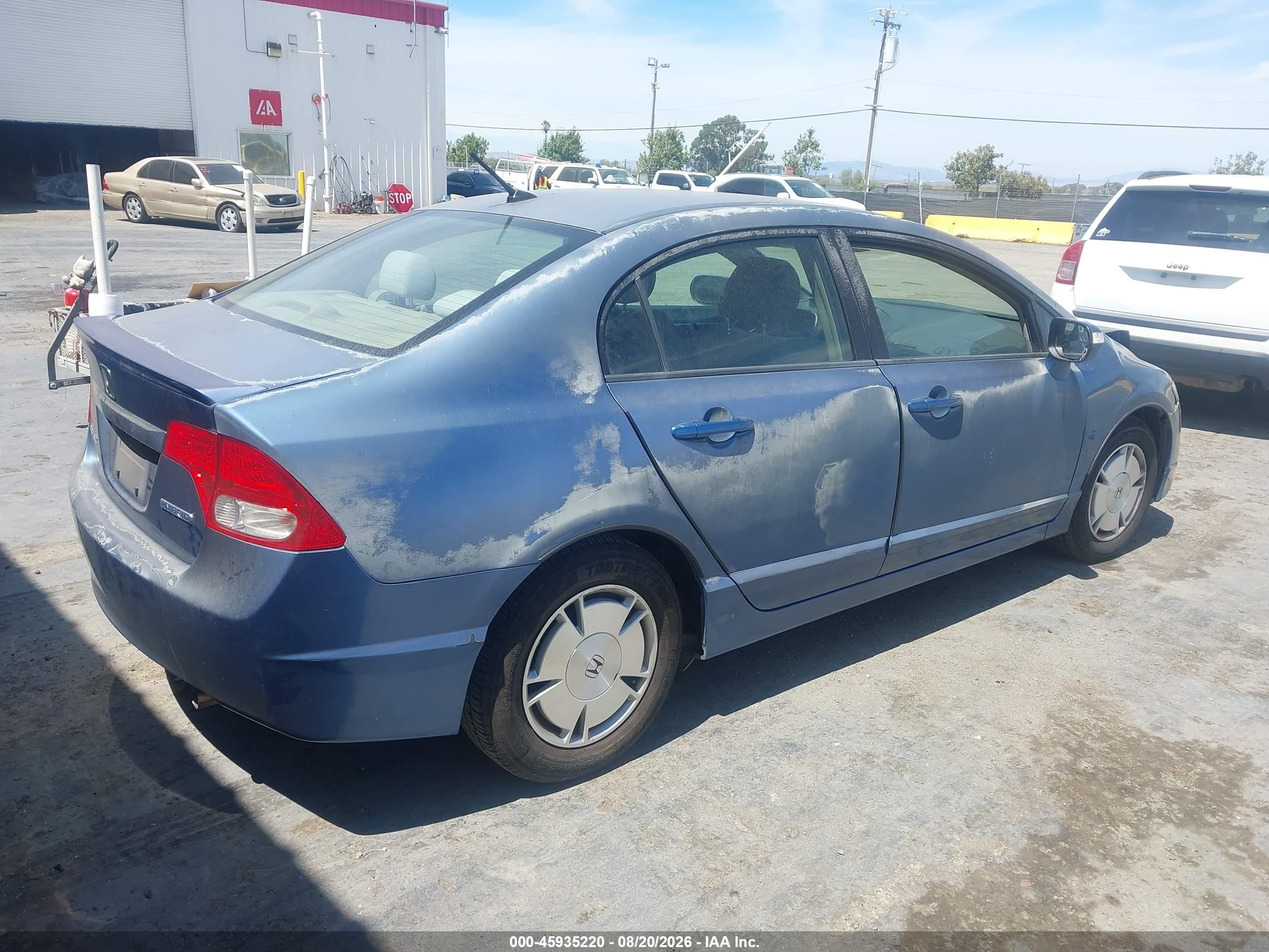 2009 Honda Civic Hybrid   Light Blue vin: JHMFA36269S002806