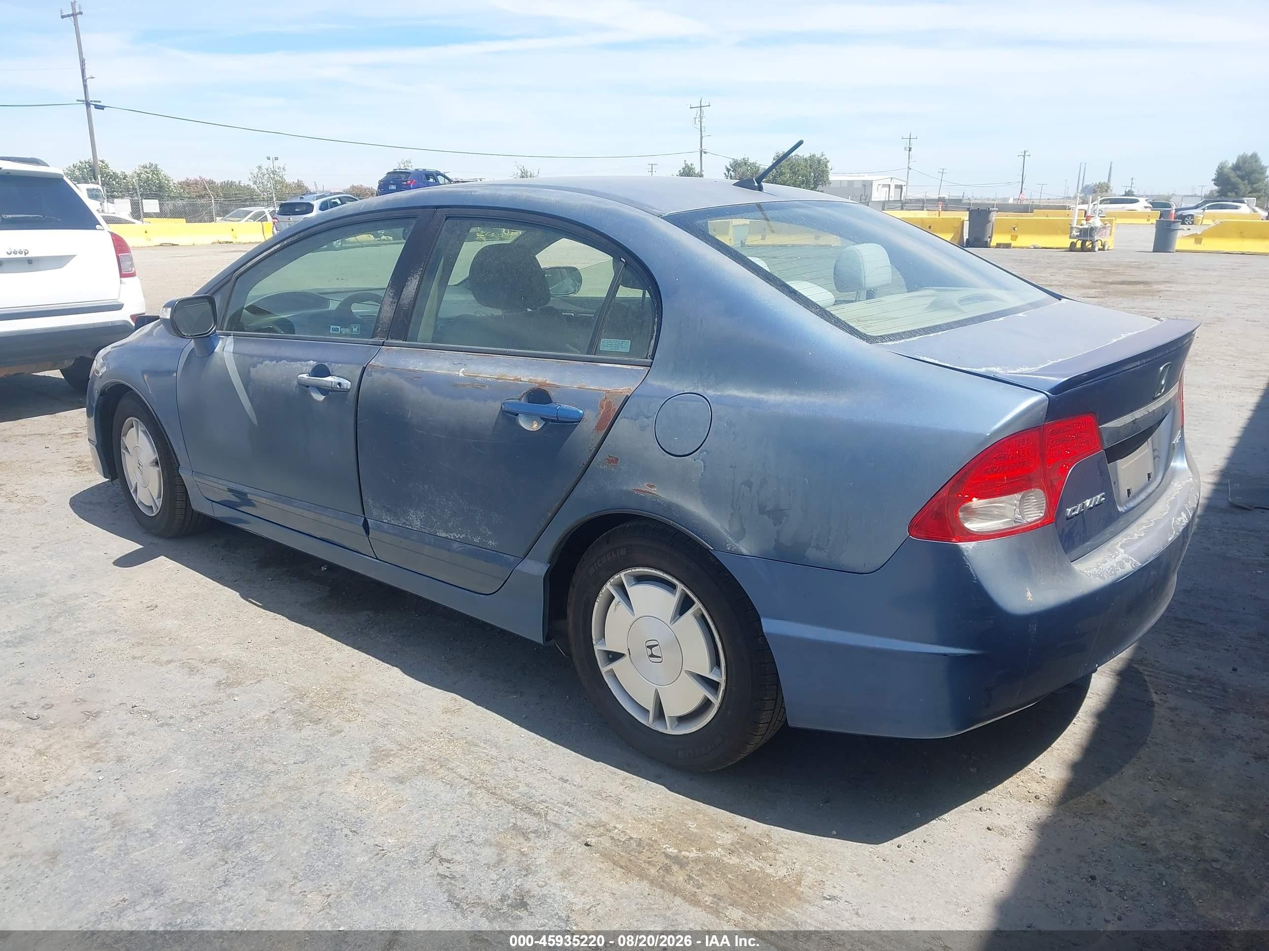 2009 Honda Civic Hybrid   Light Blue vin: JHMFA36269S002806