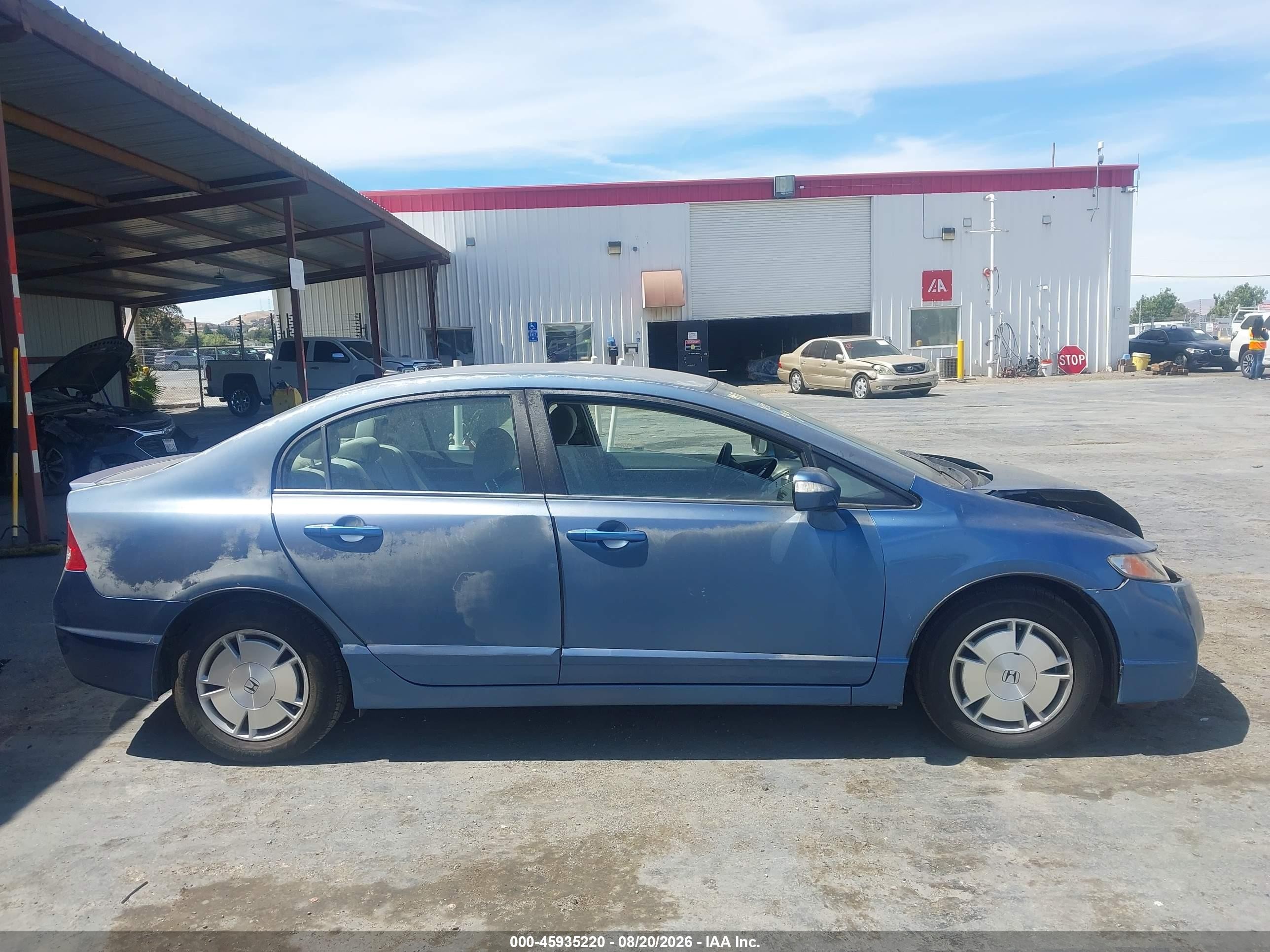 2009 Honda Civic Hybrid   Light Blue vin: JHMFA36269S002806