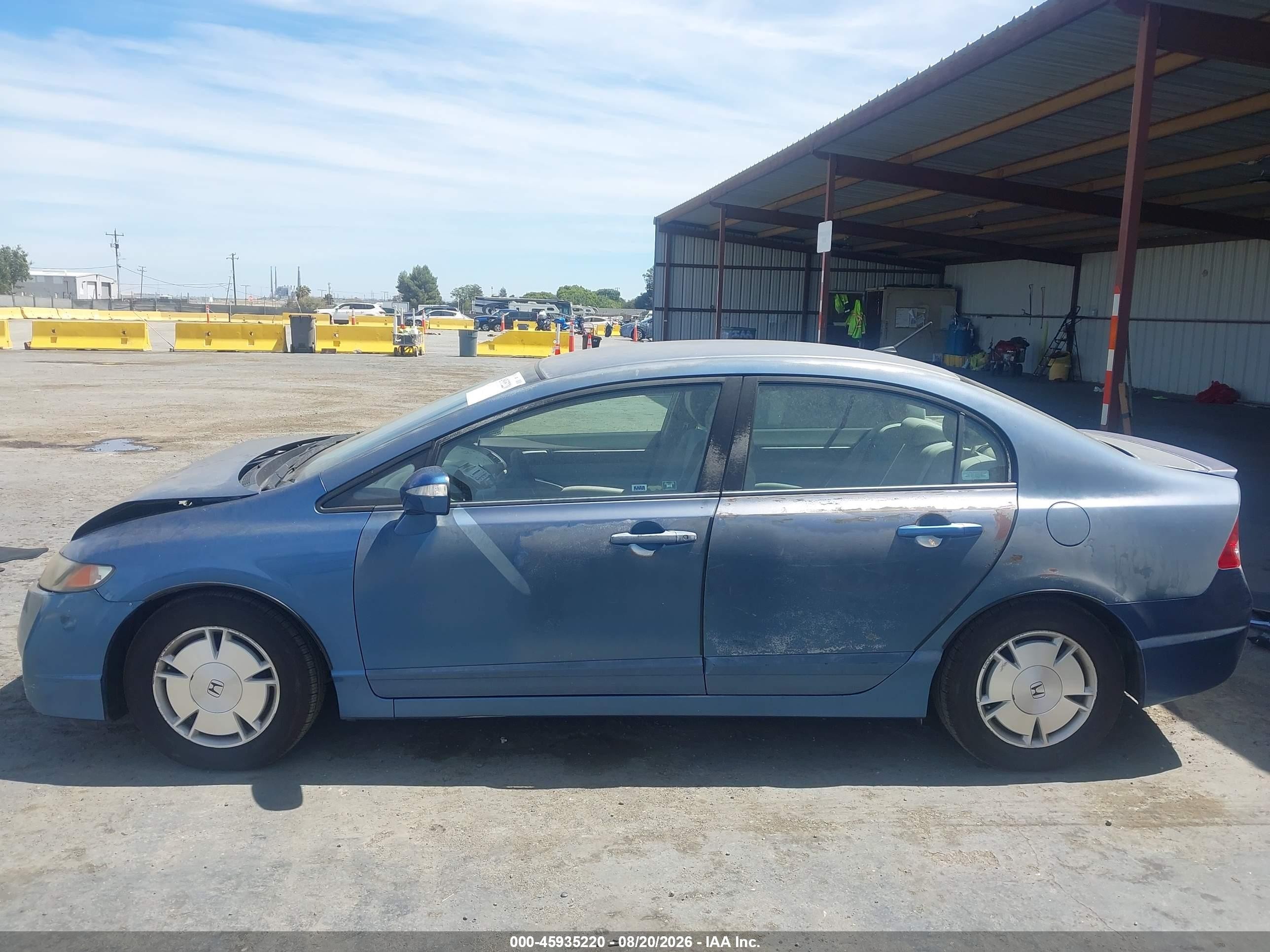 2009 Honda Civic Hybrid   Light Blue vin: JHMFA36269S002806