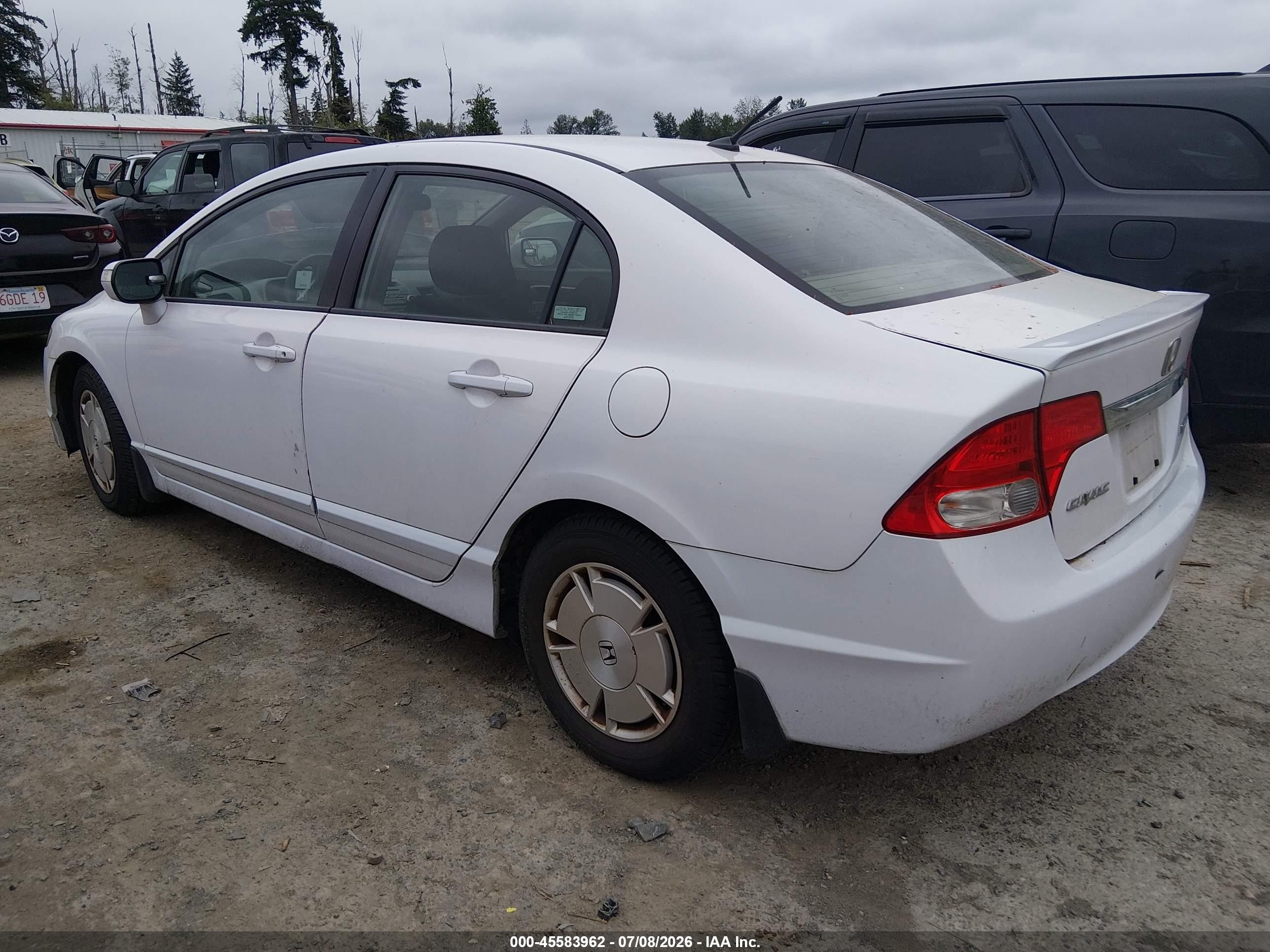 2009 Honda Civic Hybrid   White vin: JHMFA36269S003499