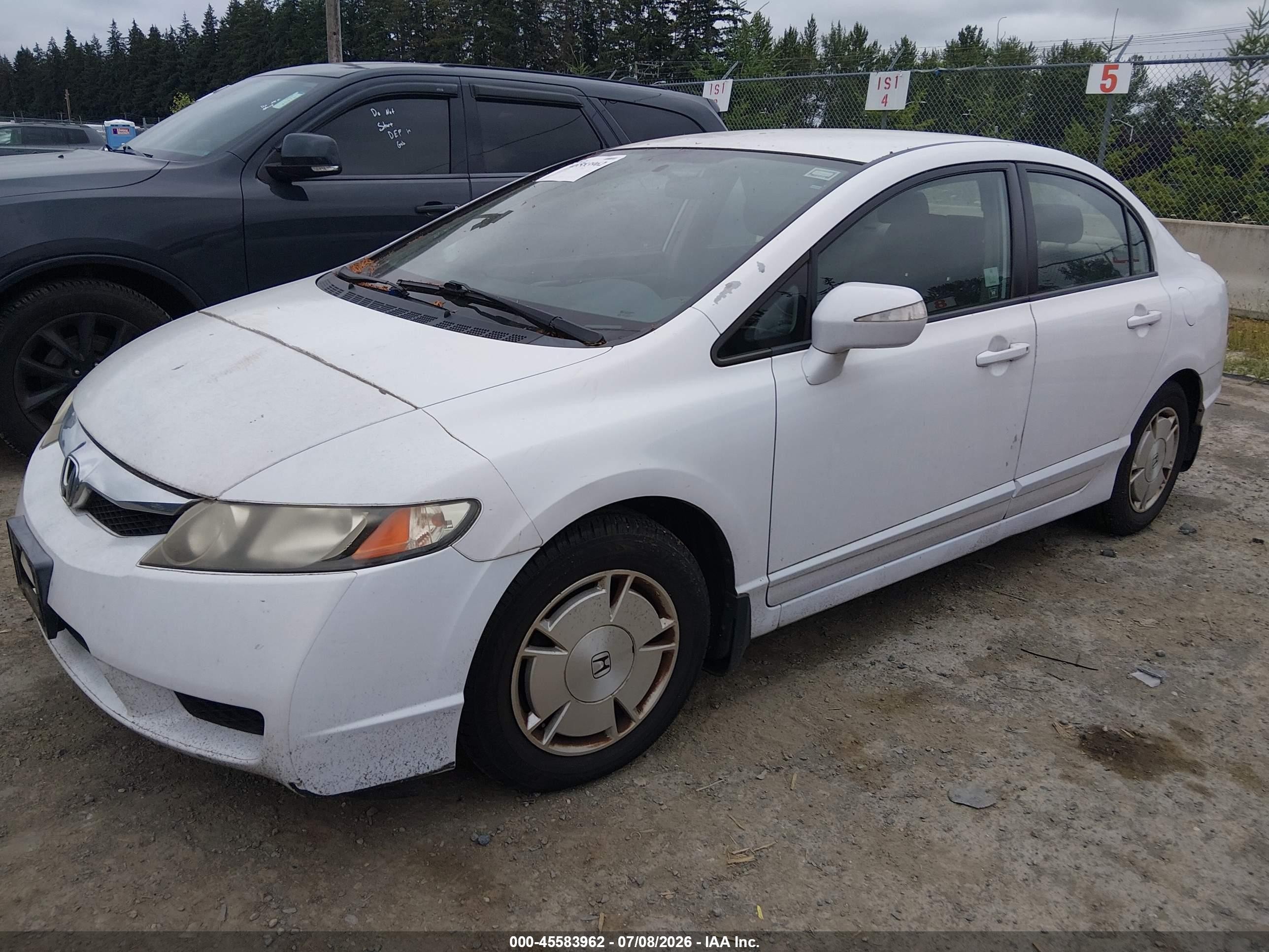 2009 Honda Civic Hybrid   White vin: JHMFA36269S003499