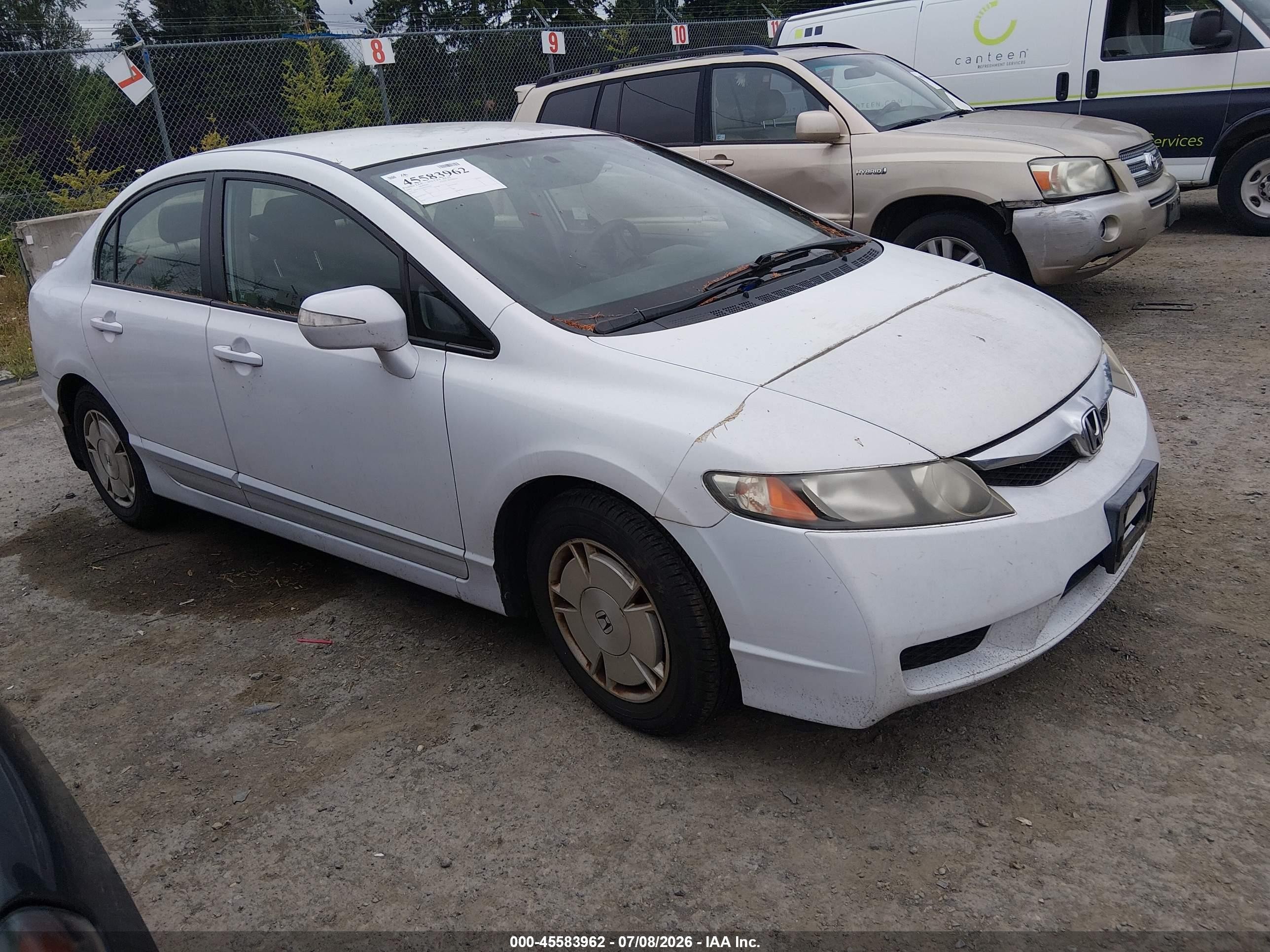 2009 Honda Civic Hybrid   White vin: JHMFA36269S003499