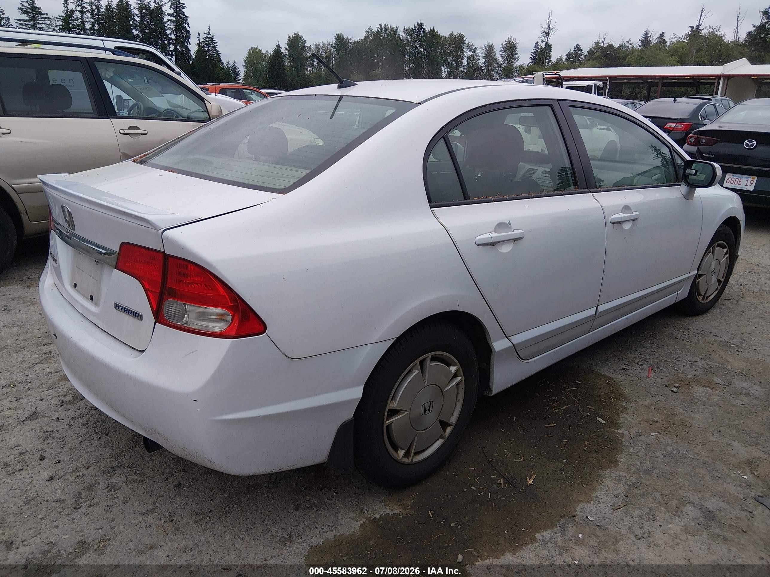 2009 Honda Civic Hybrid   White vin: JHMFA36269S003499
