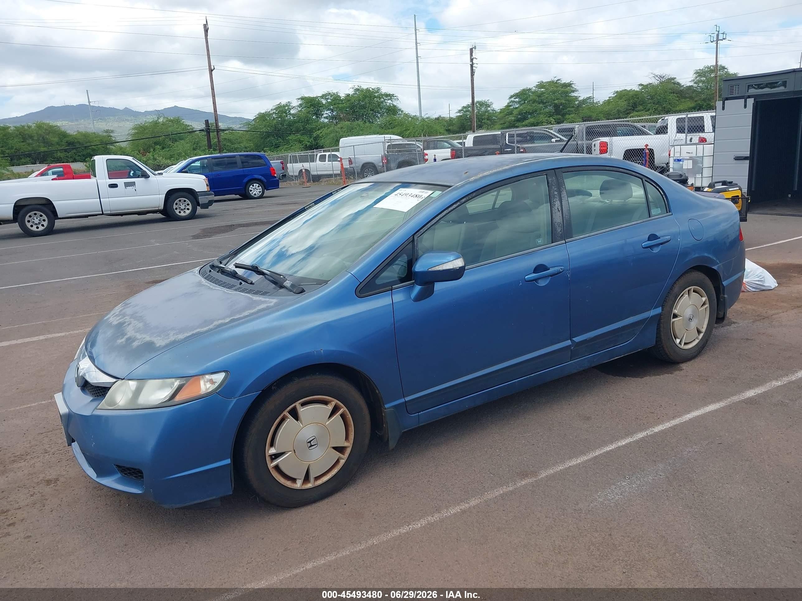 2009 Honda Civic Hybrid   Light Blue vin: JHMFA36269S008010