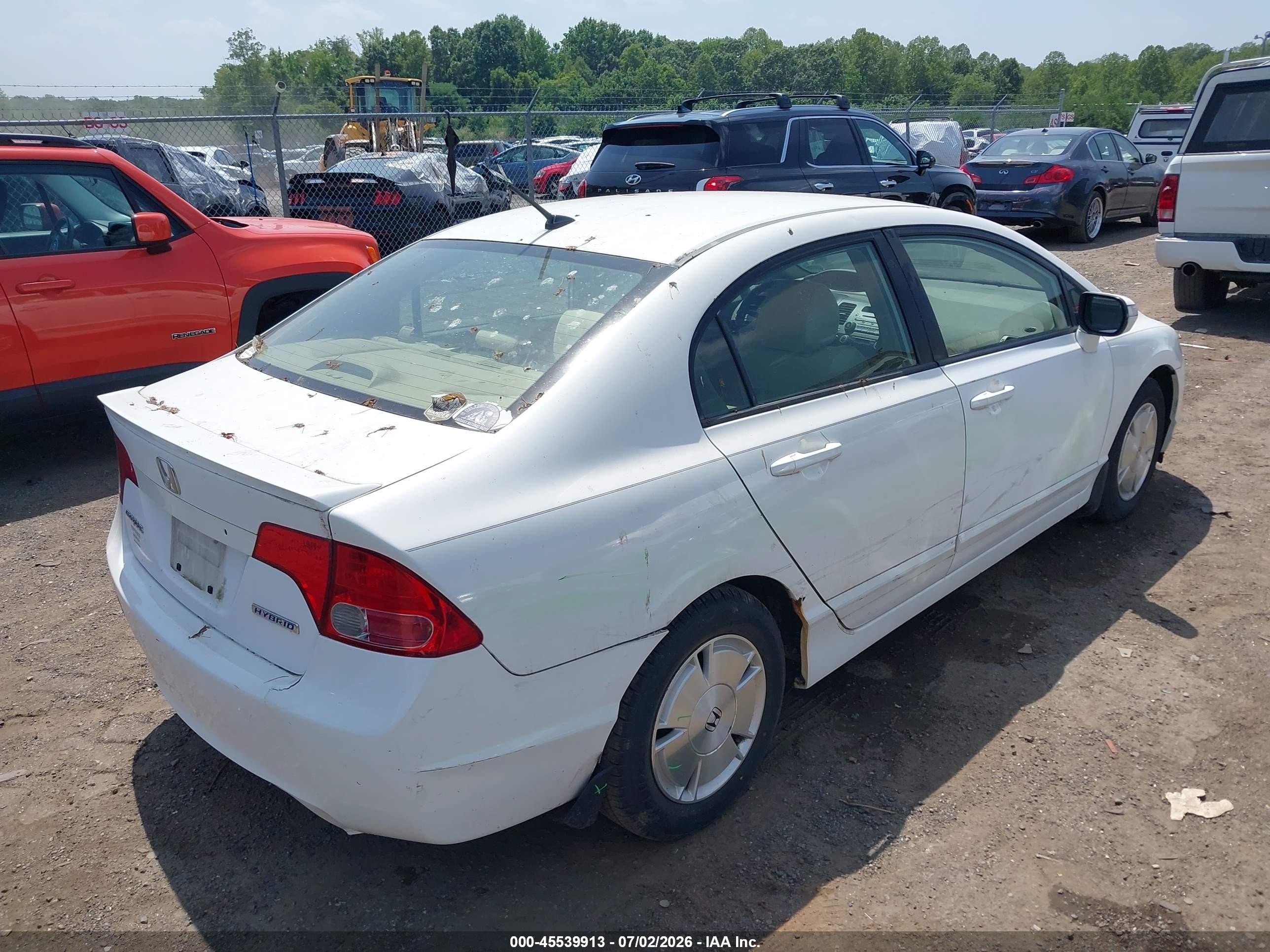 2006 Honda Civic Hybrid   White vin: JHMFA36286S005332
