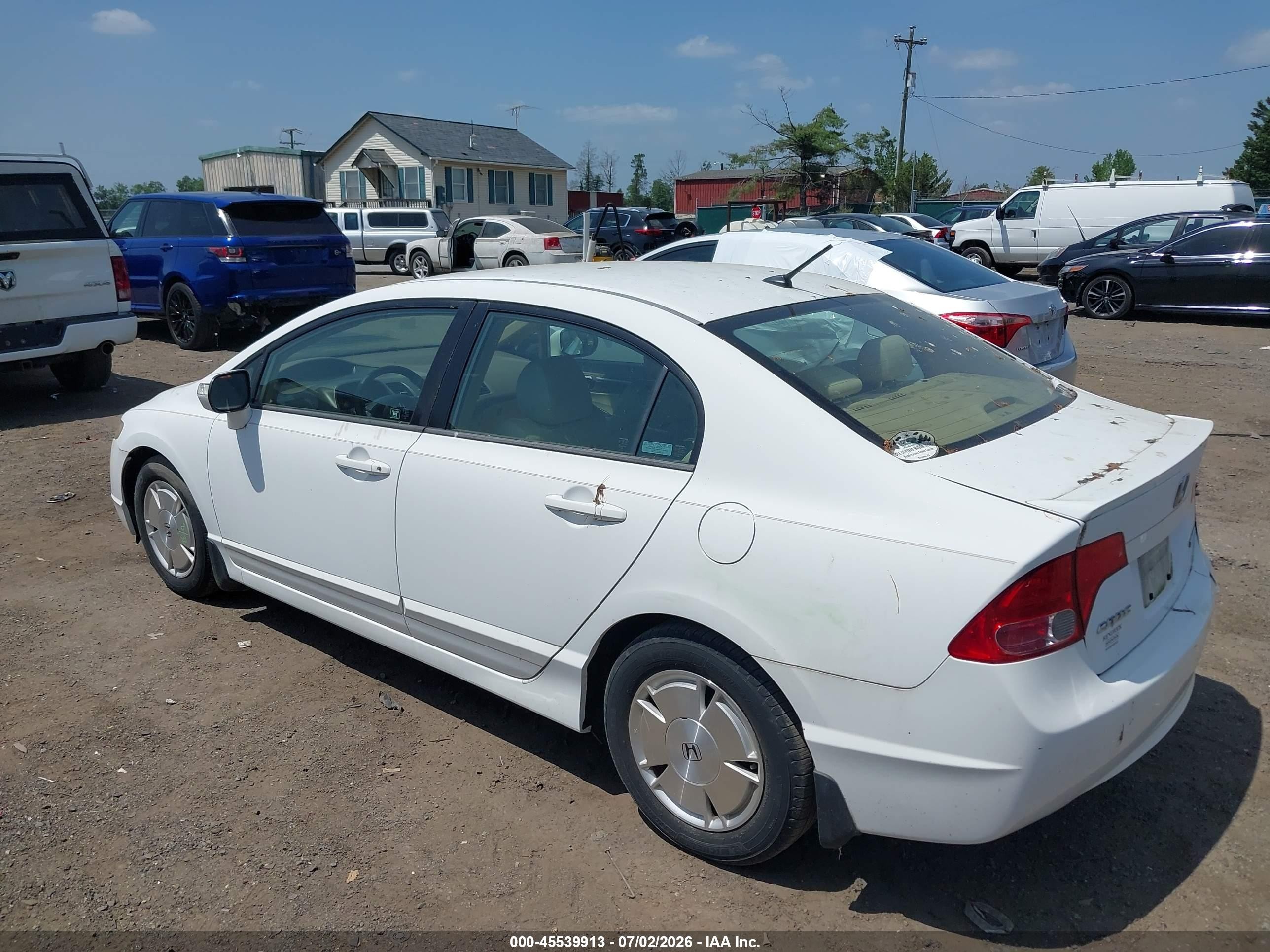 2006 Honda Civic Hybrid   White vin: JHMFA36286S005332