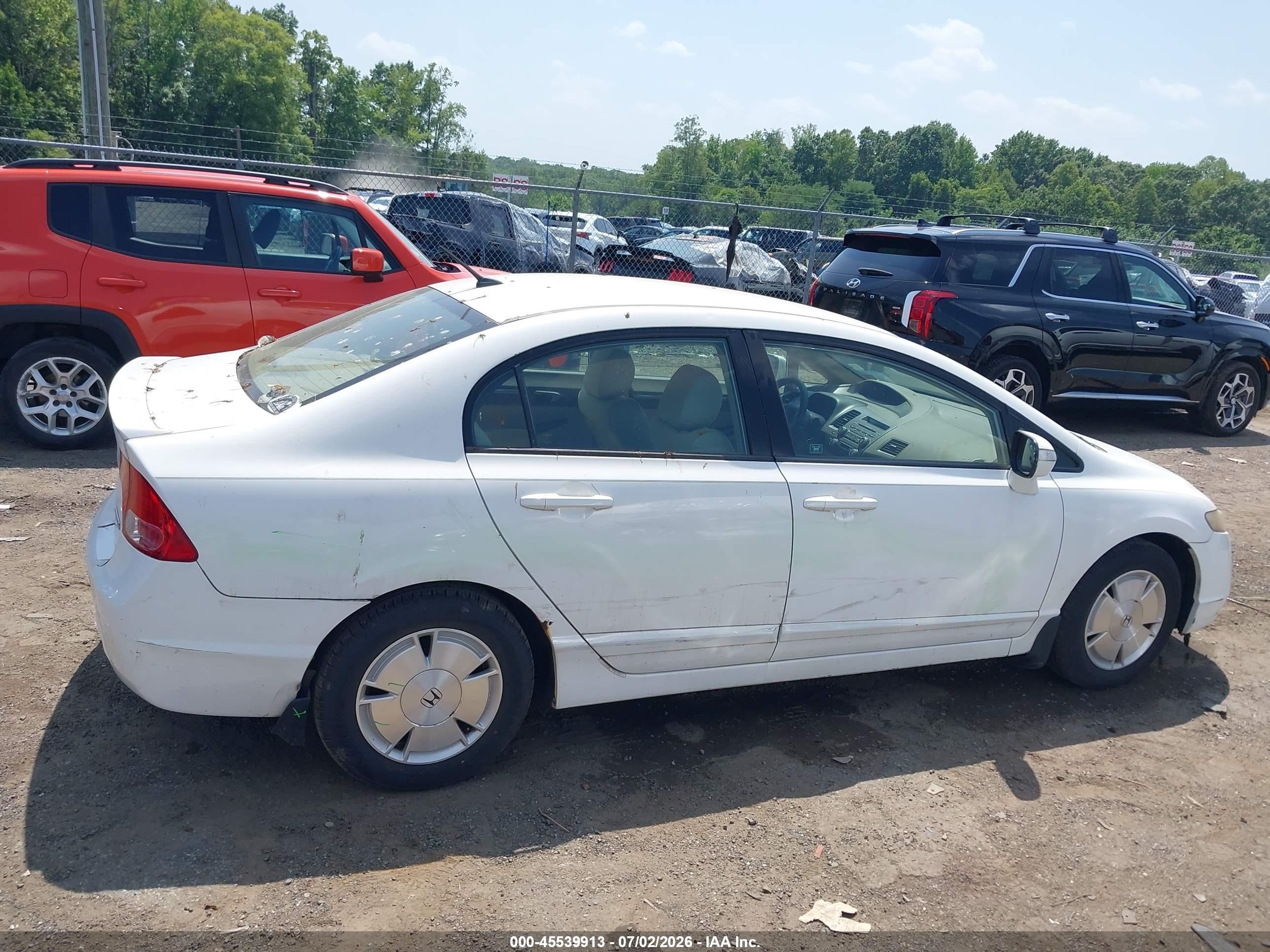 2006 Honda Civic Hybrid   White vin: JHMFA36286S005332