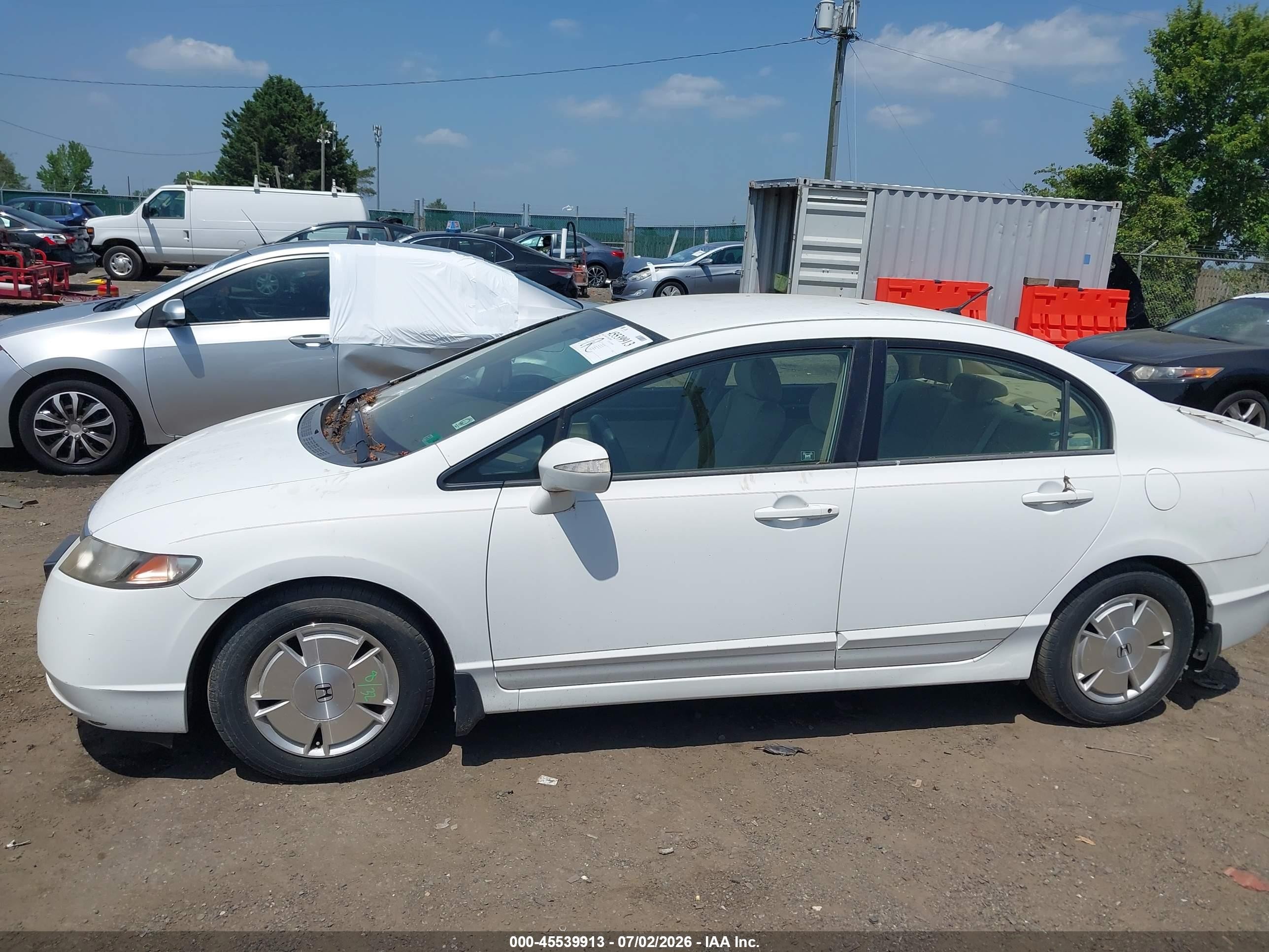 2006 Honda Civic Hybrid   White vin: JHMFA36286S005332