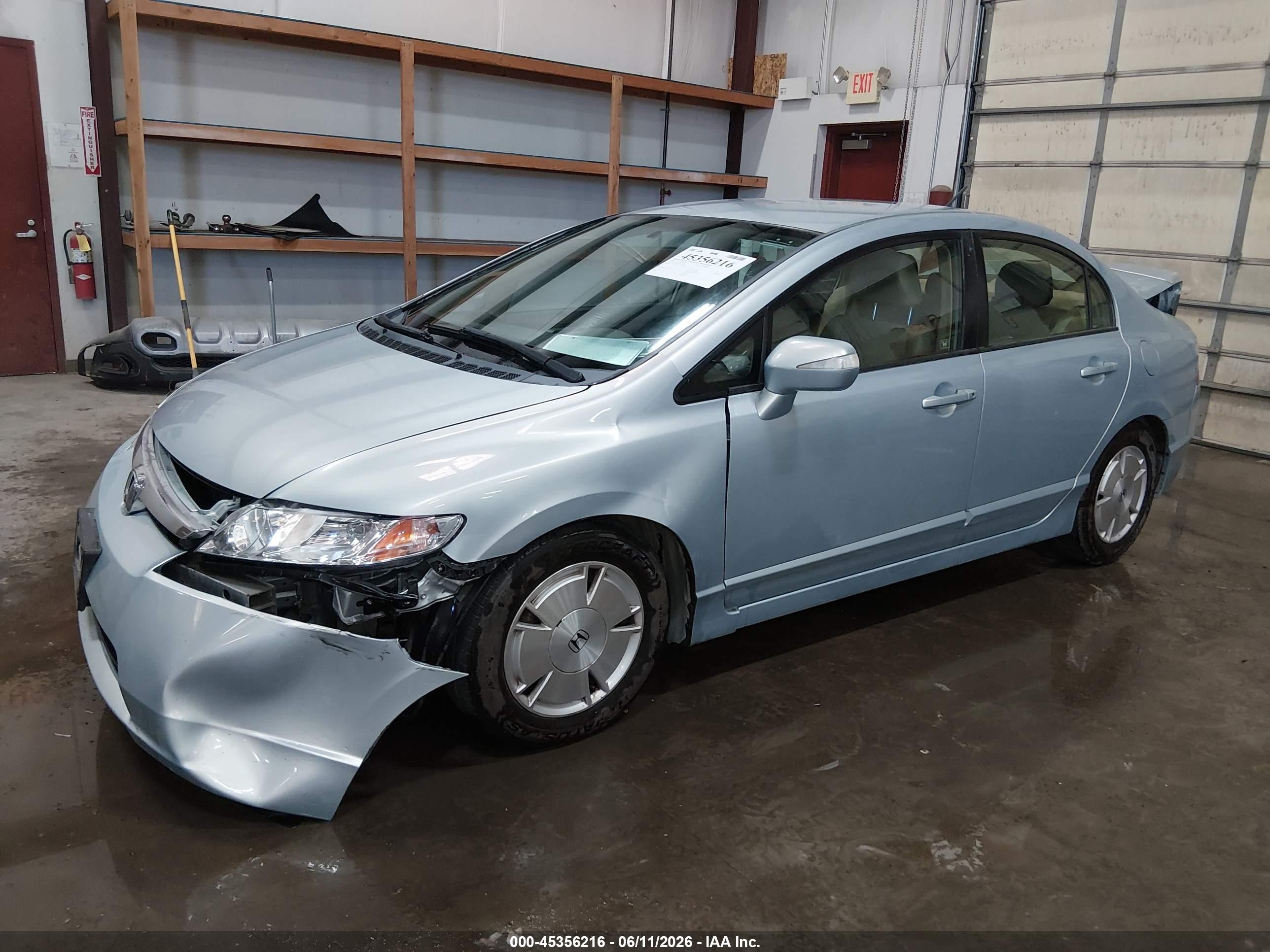 2006 Honda Civic Hybrid Light Blue vin: JHMFA36286S019019