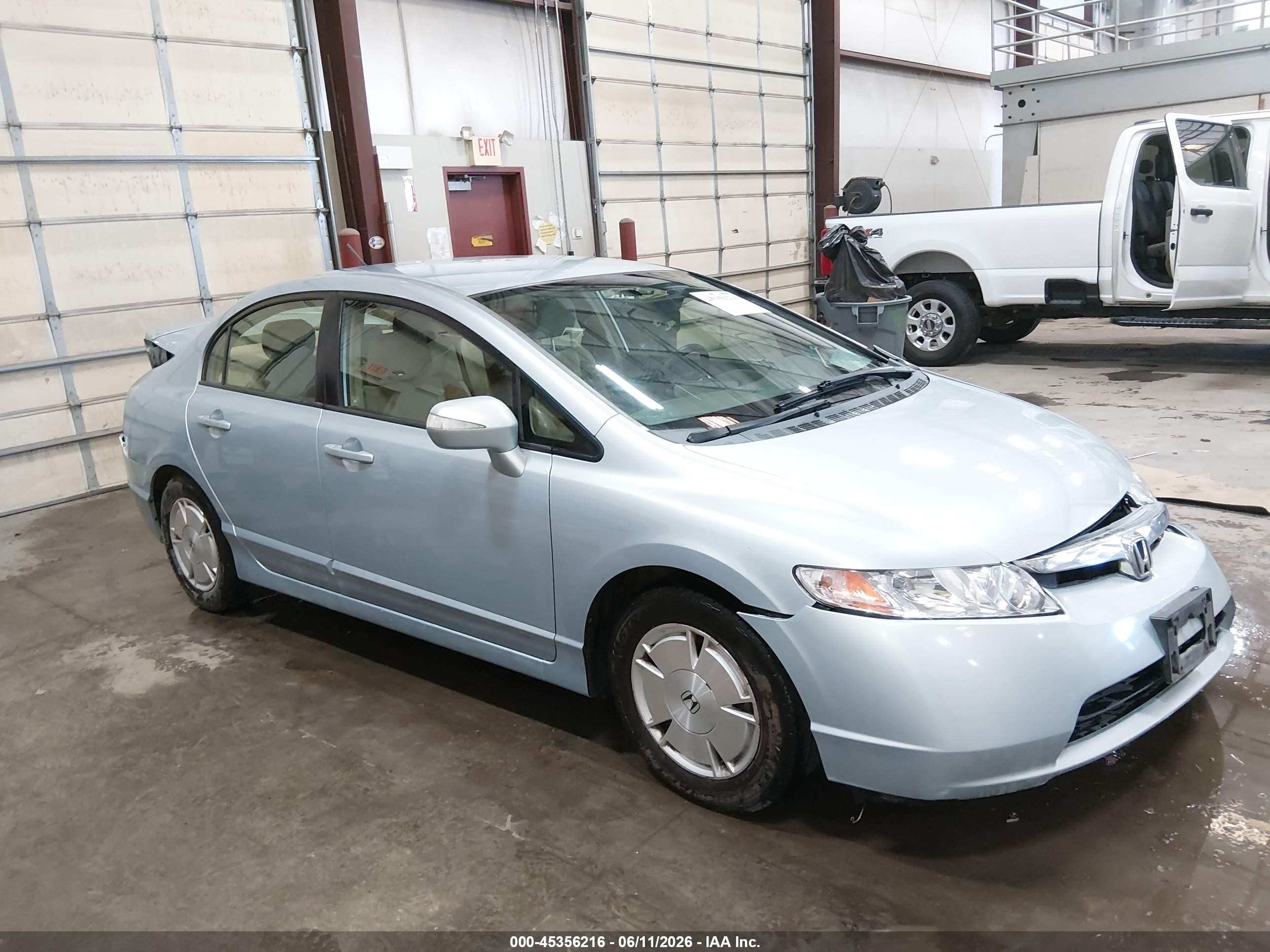 2006 Honda Civic Hybrid Light Blue vin: JHMFA36286S019019