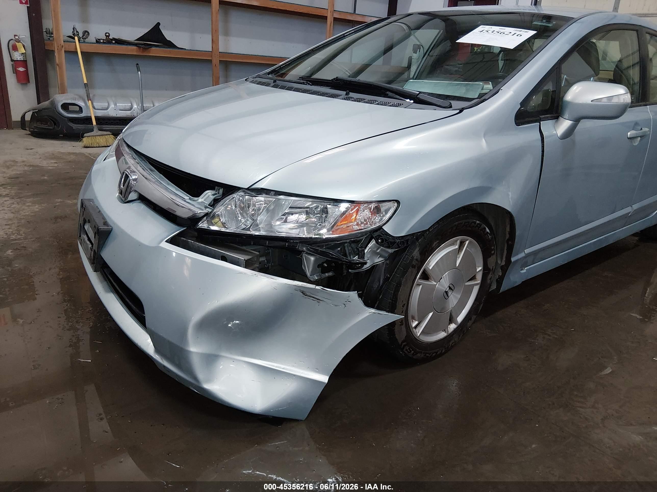 2006 Honda Civic Hybrid Light Blue vin: JHMFA36286S019019