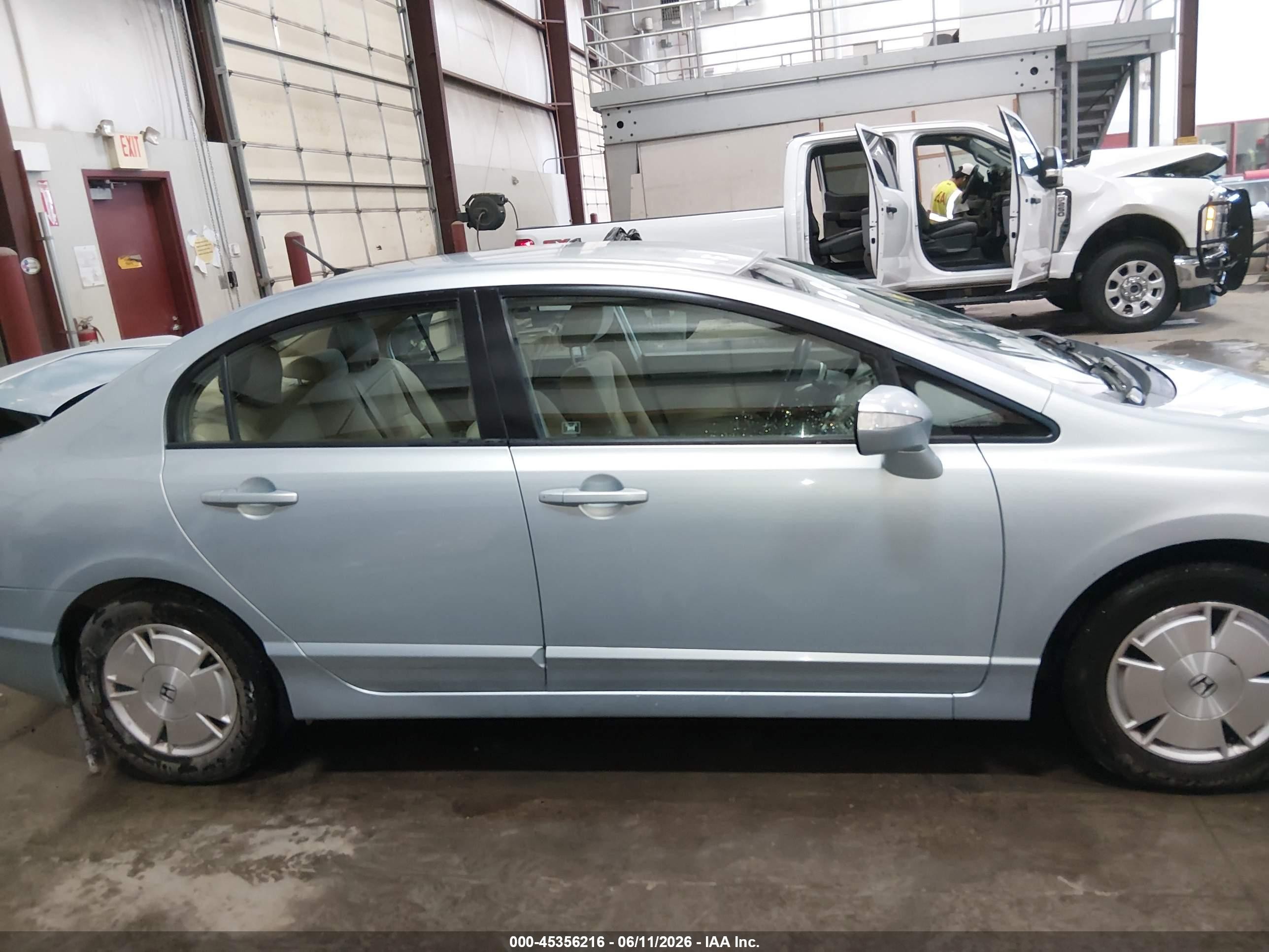 2006 Honda Civic Hybrid Light Blue vin: JHMFA36286S019019