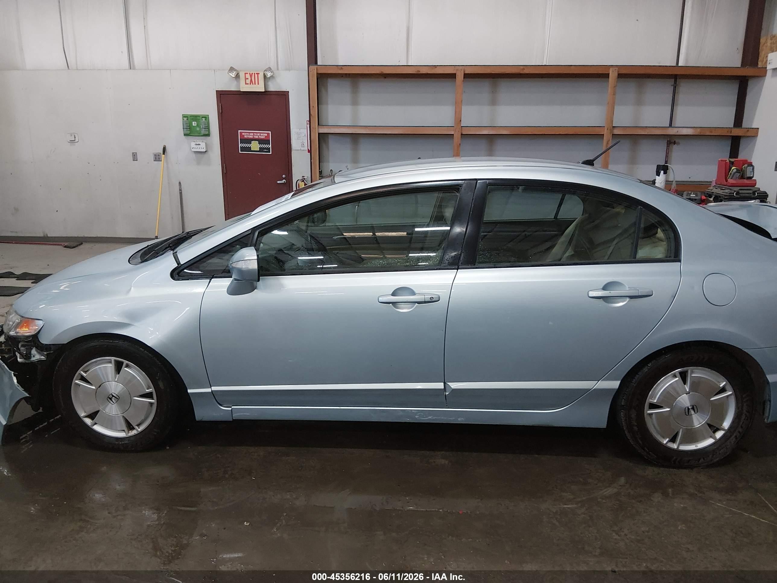 2006 Honda Civic Hybrid Light Blue vin: JHMFA36286S019019