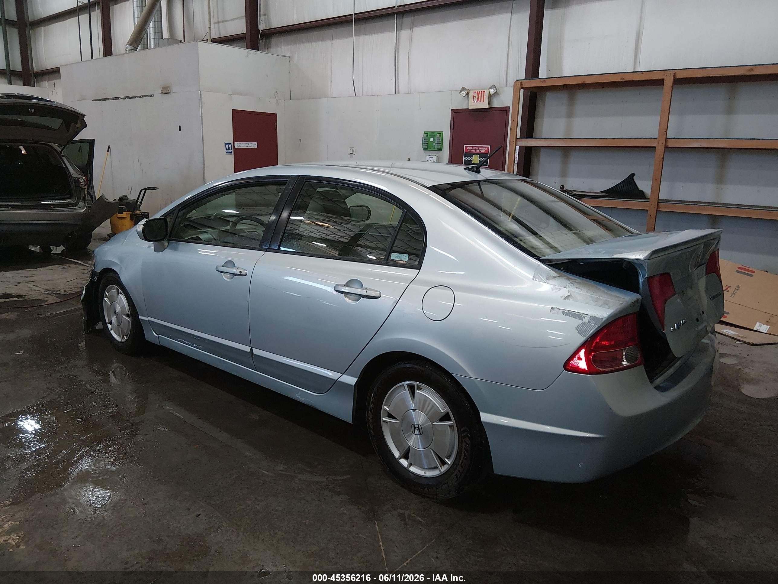 2006 Honda Civic Hybrid Light Blue vin: JHMFA36286S019019