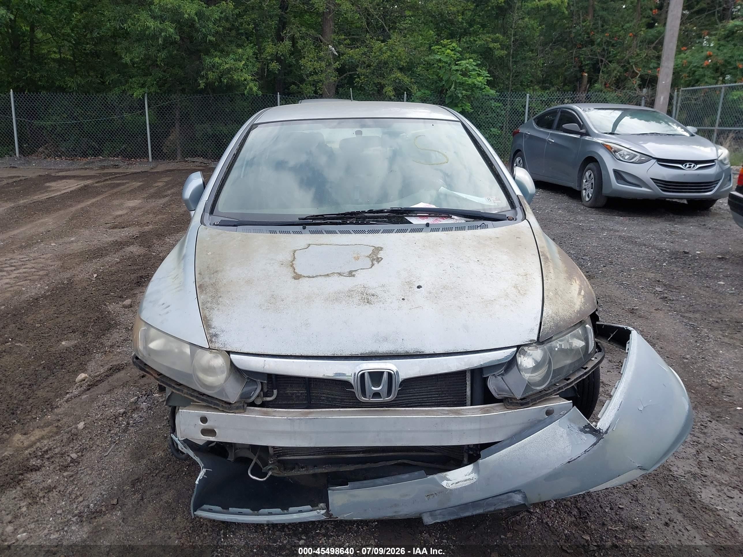 2007 Honda Civic Hybrid   Light Blue vin: JHMFA36297S004434