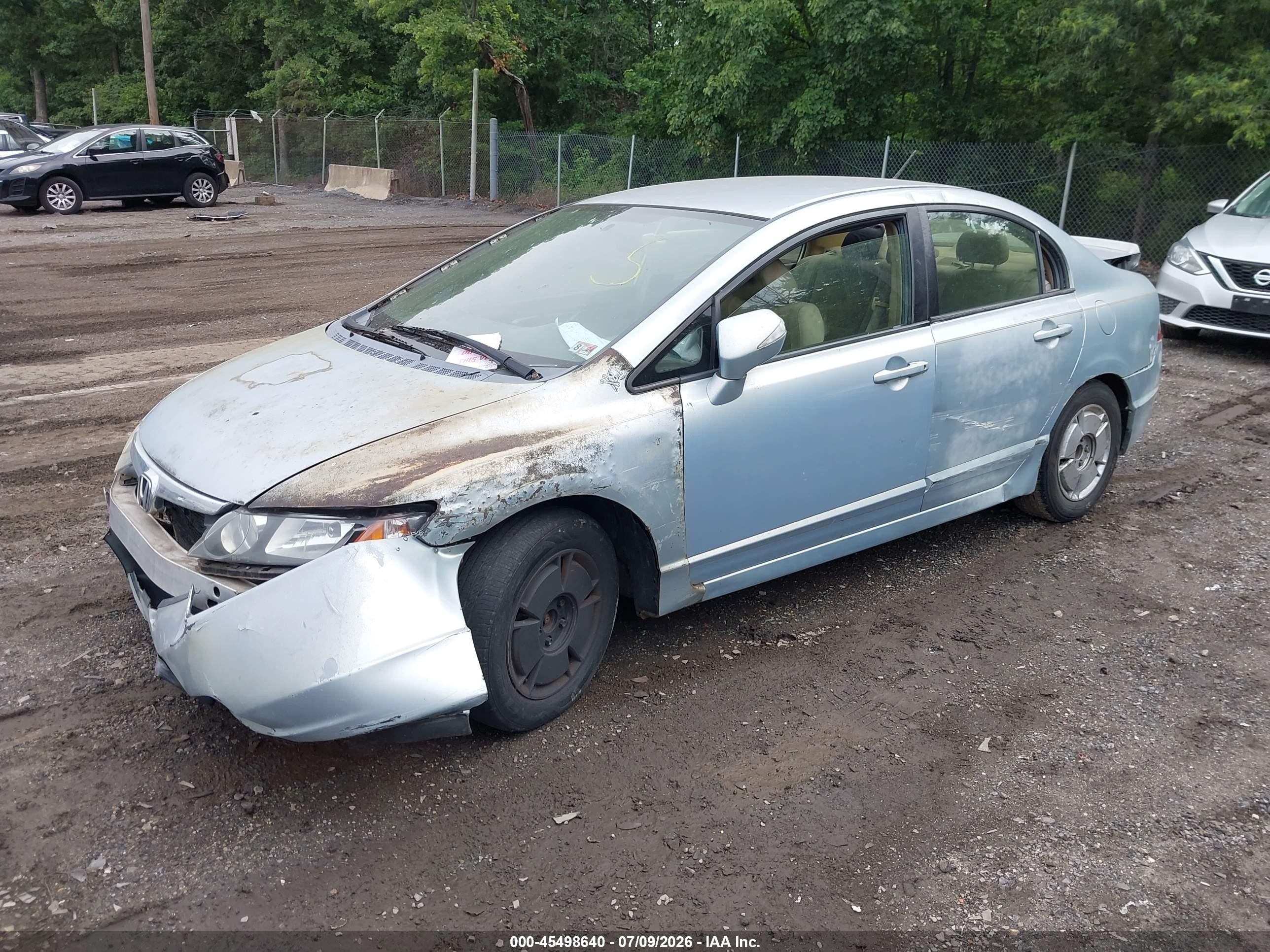 2007 Honda Civic Hybrid   Light Blue vin: JHMFA36297S004434