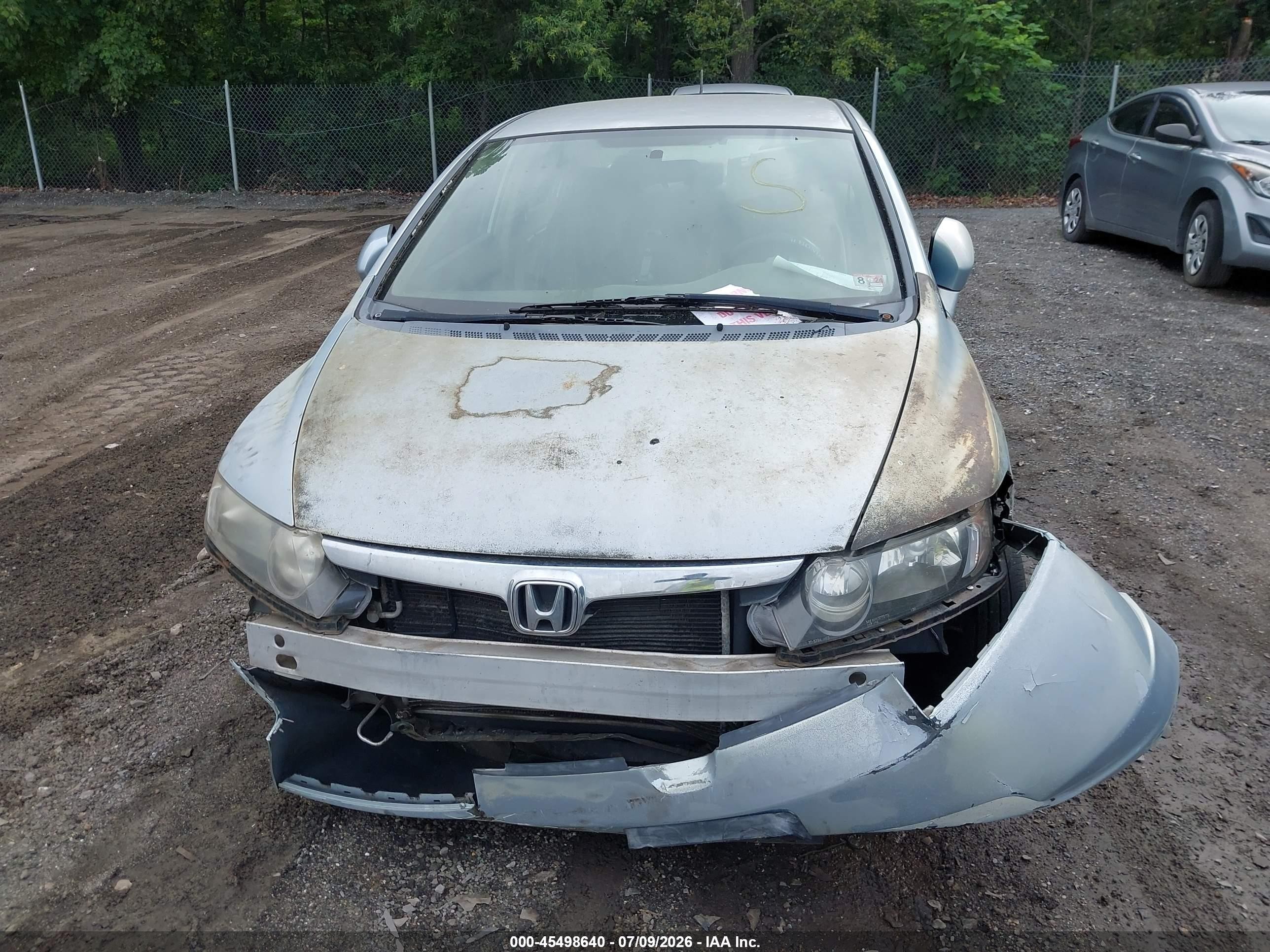 2007 Honda Civic Hybrid   Light Blue vin: JHMFA36297S004434