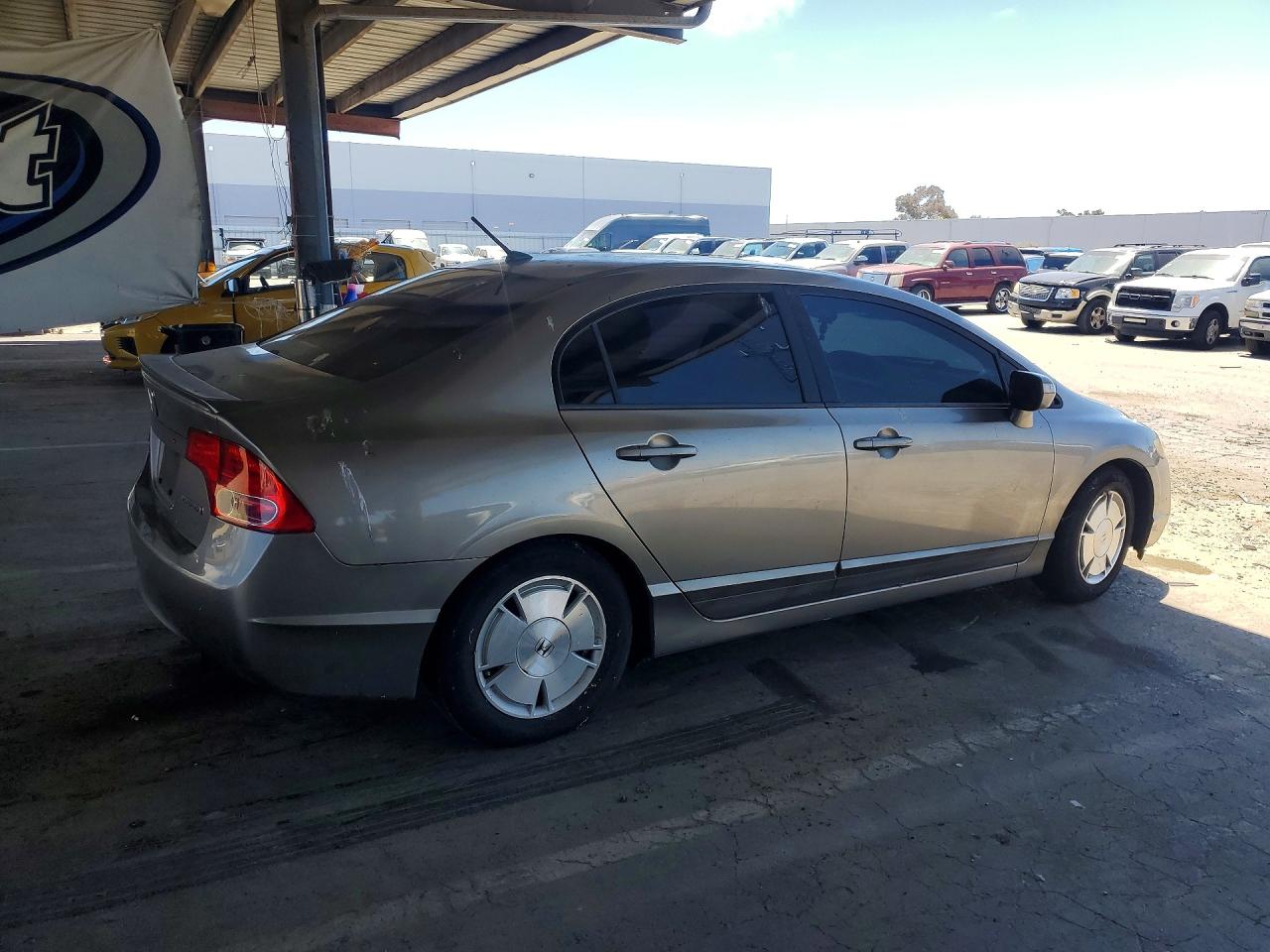 2007 Honda Civic Hybrid Brown vin: JHMFA36297S007589