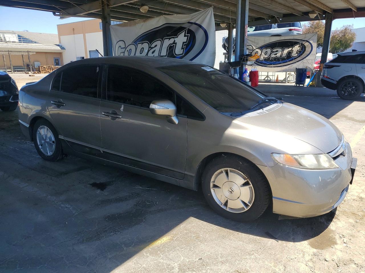 2007 Honda Civic Hybrid Brown vin: JHMFA36297S007589