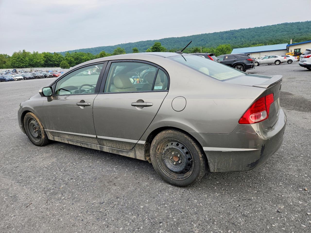 2007 Honda Civic Hybrid Желто-коричневый vin: JHMFA36297S014879