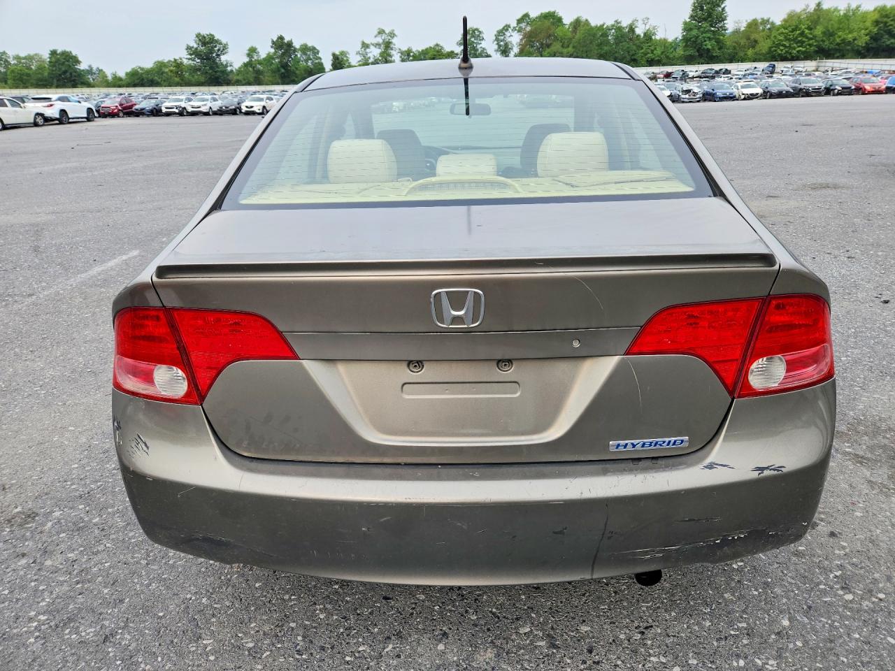 2007 Honda Civic Hybrid Желто-коричневый vin: JHMFA36297S014879