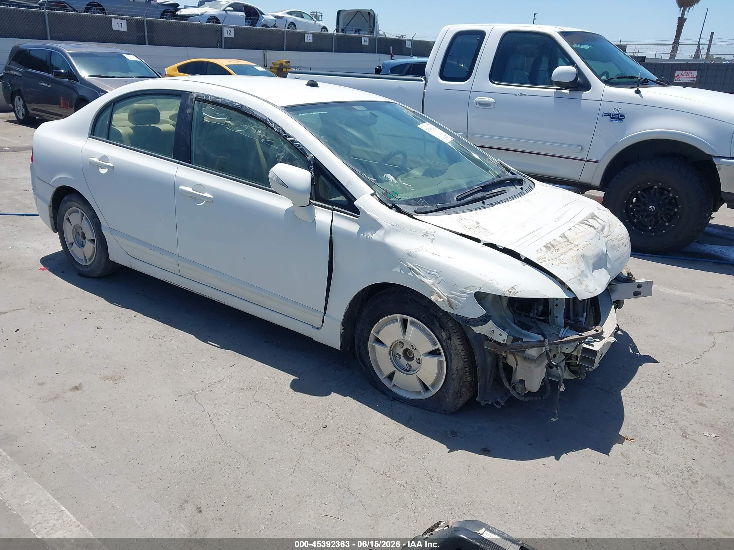 2007 Honda Civic Hybrid   White vin: JHMFA36297S017183