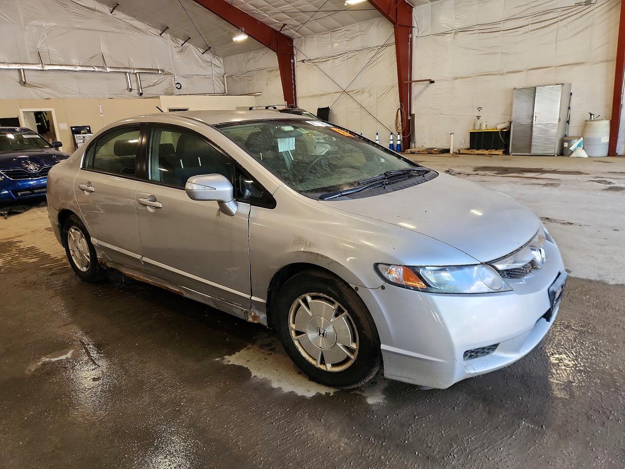 2009 Honda Civic Hybrid Серебряный vin: JHMFA36299S001004