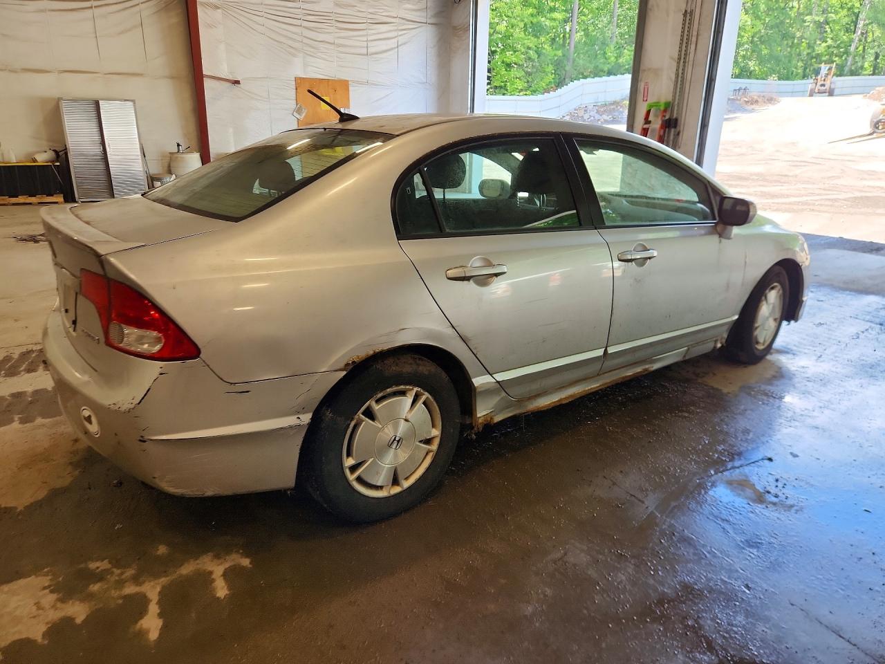 2009 Honda Civic Hybrid Серебряный vin: JHMFA36299S001004