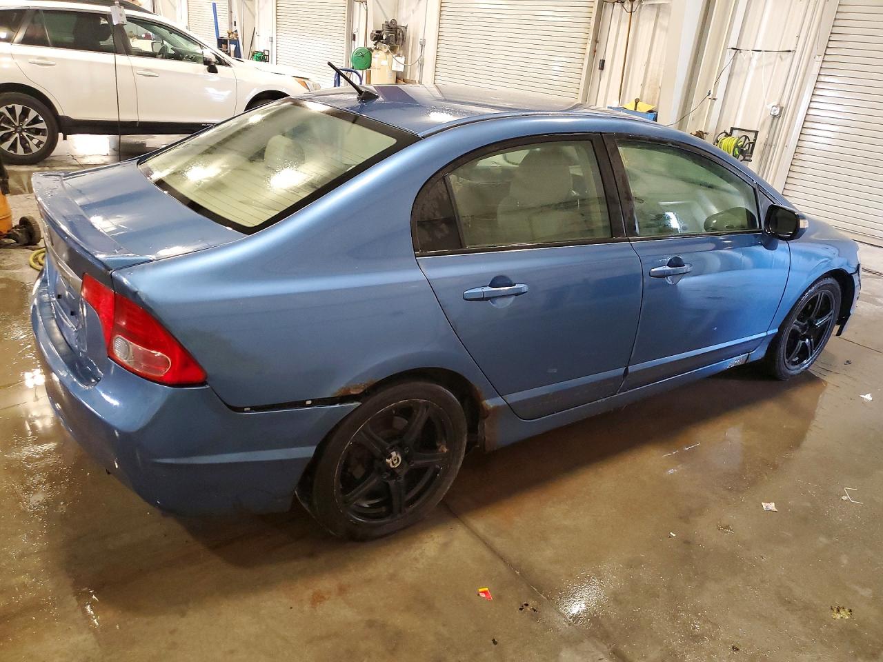 2009 Honda Civic Hybrid Blue vin: JHMFA36299S005117