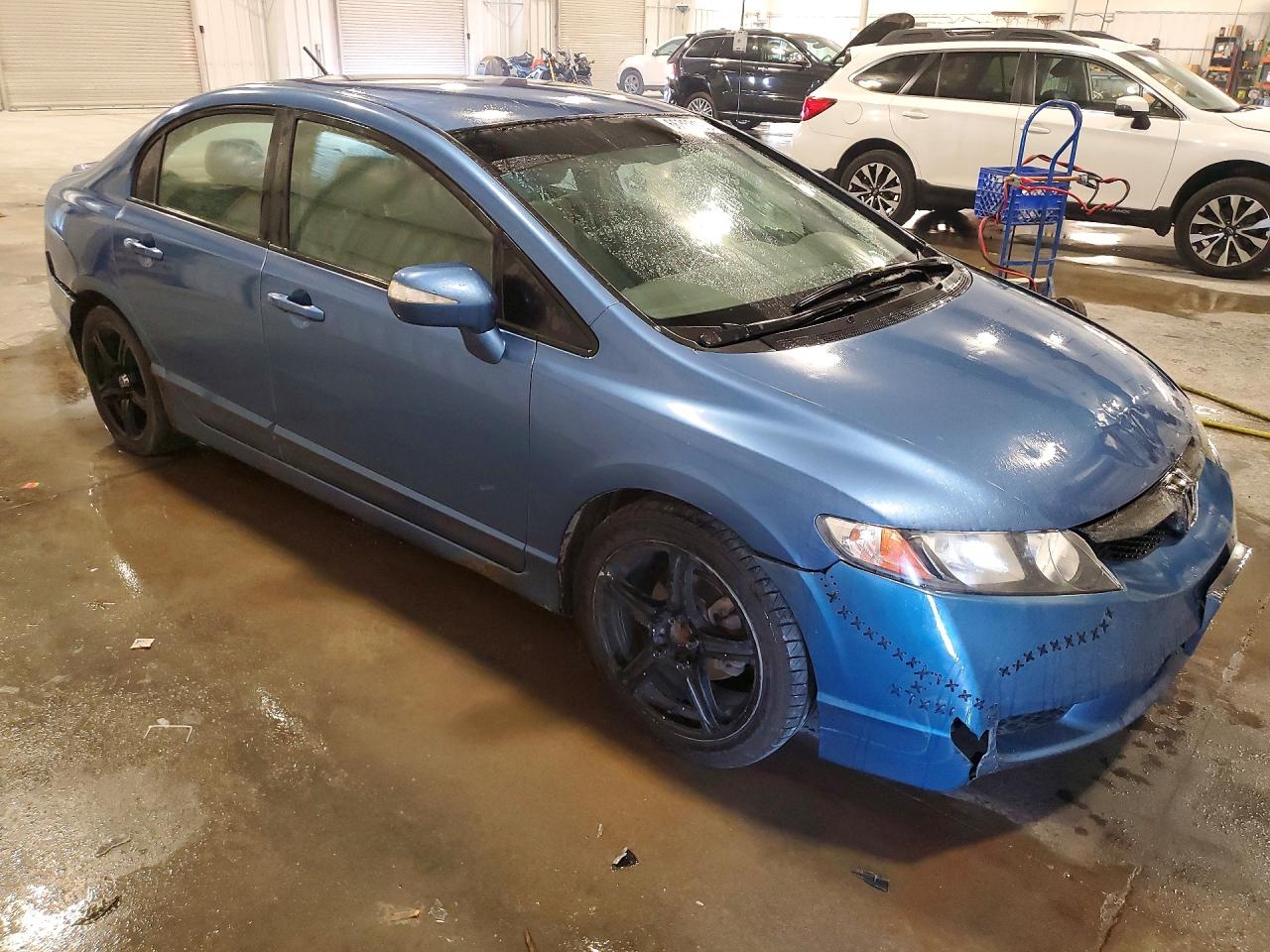 2009 Honda Civic Hybrid Blue vin: JHMFA36299S005117