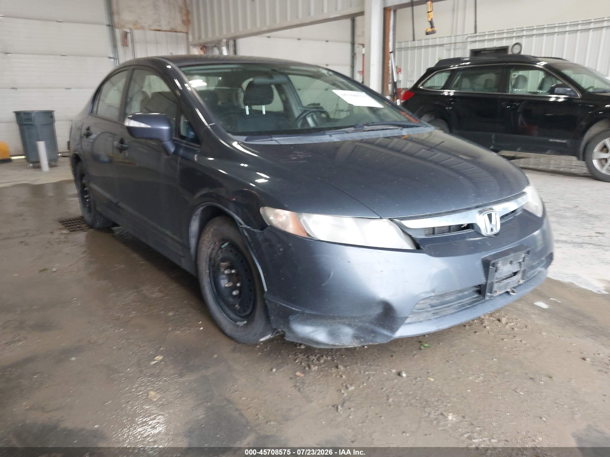 2007 Honda Civic Hybrid   Blue vin: JHMFA362X7S011084