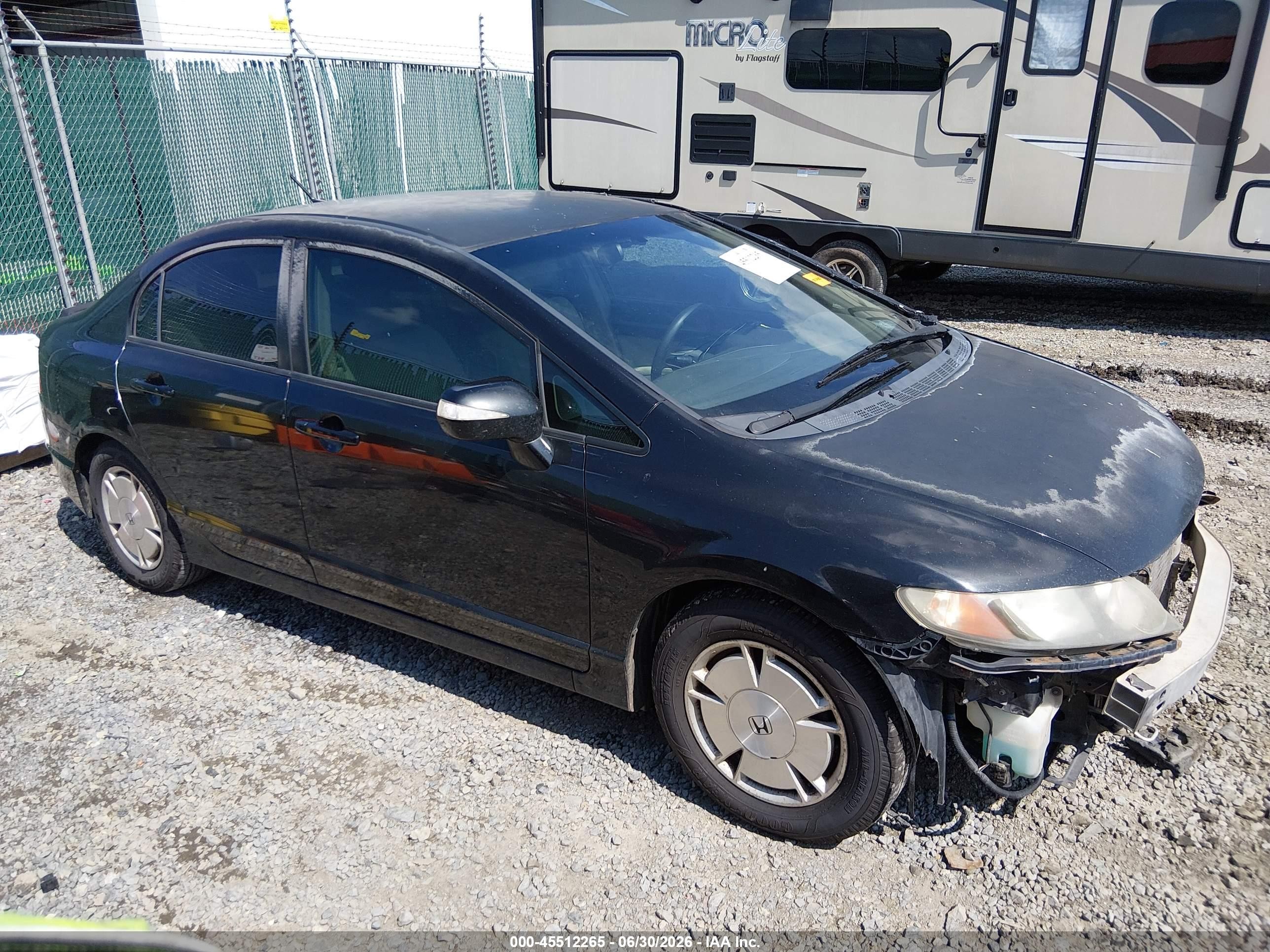 2009 Honda Civic Hybrid   Black vin: JHMFA362X9S018121