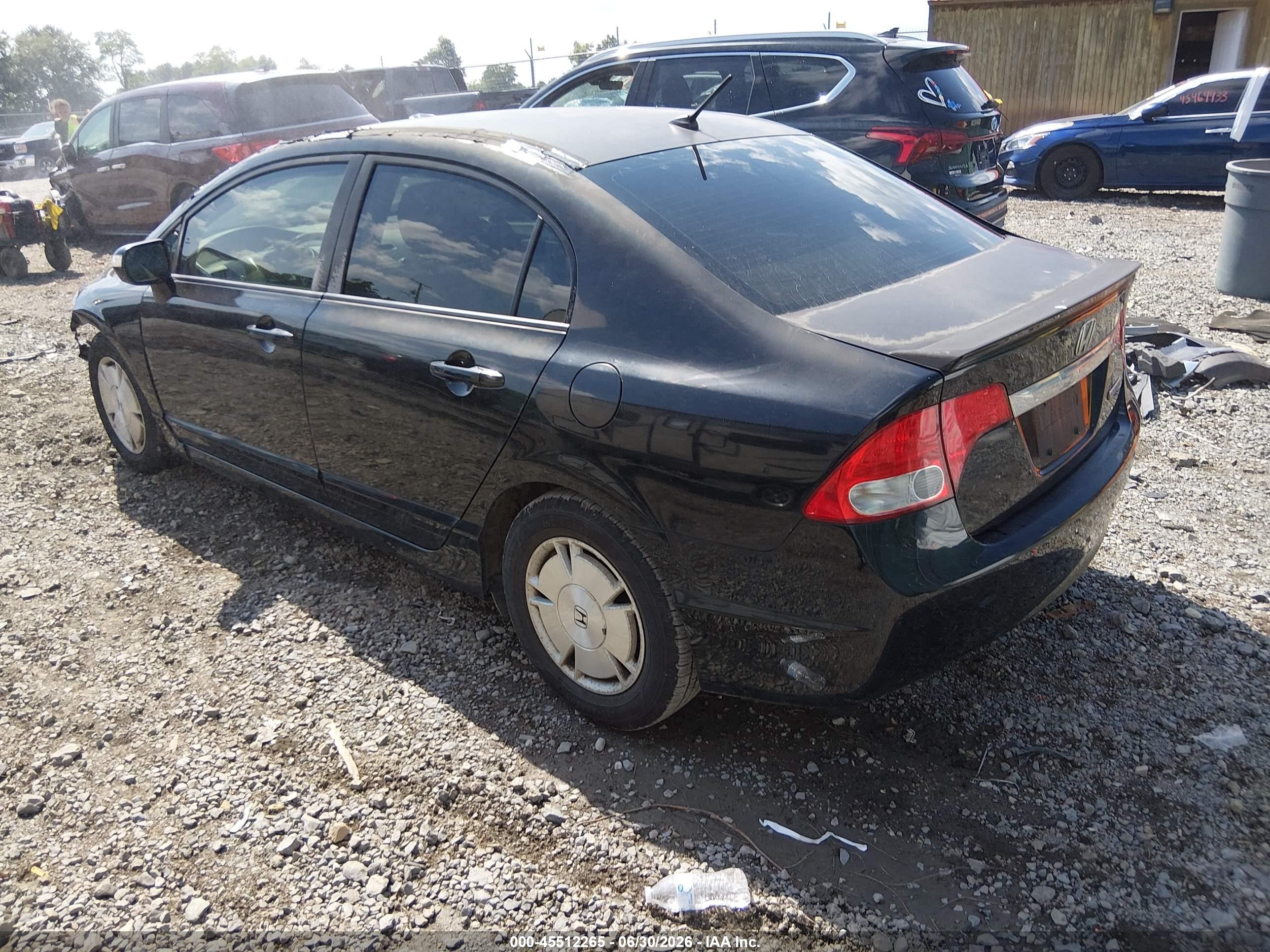 2009 Honda Civic Hybrid   Black vin: JHMFA362X9S018121
