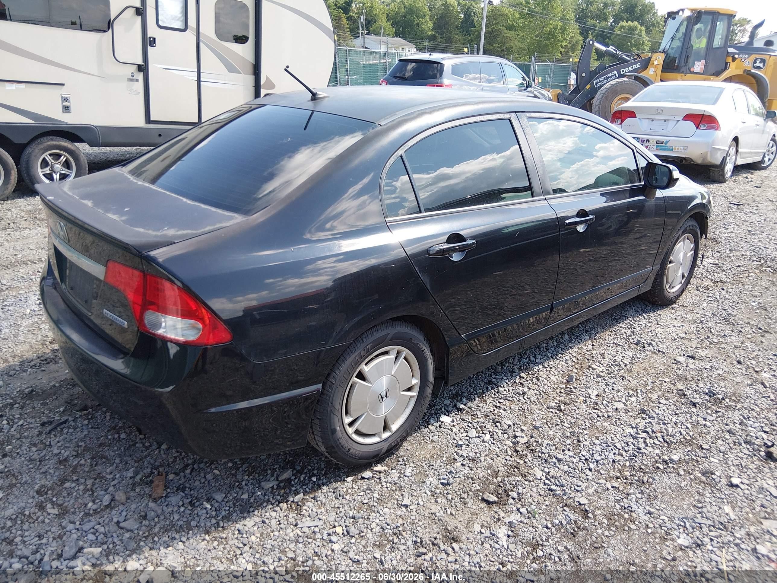 2009 Honda Civic Hybrid   Black vin: JHMFA362X9S018121