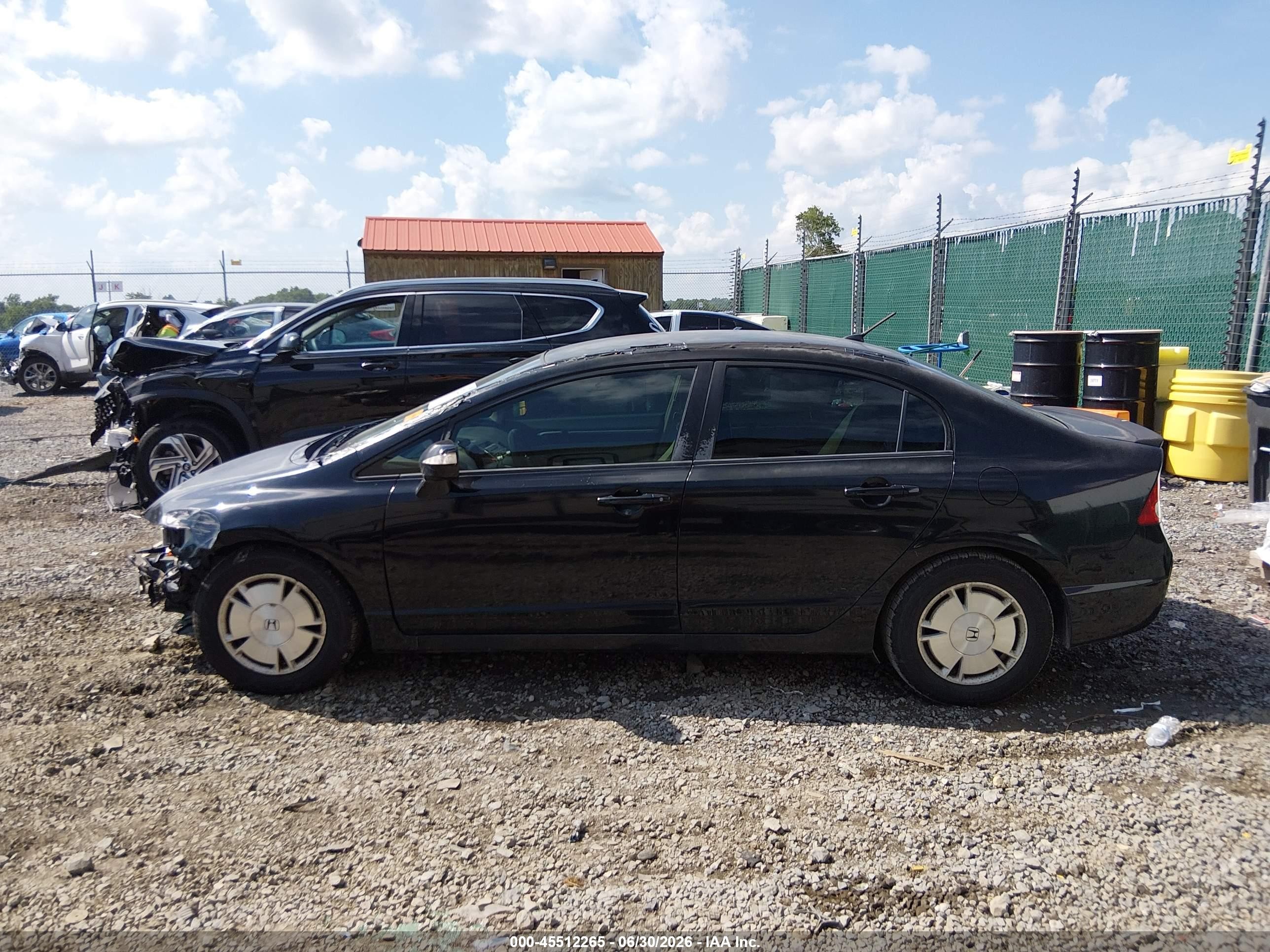 2009 Honda Civic Hybrid   Black vin: JHMFA362X9S018121