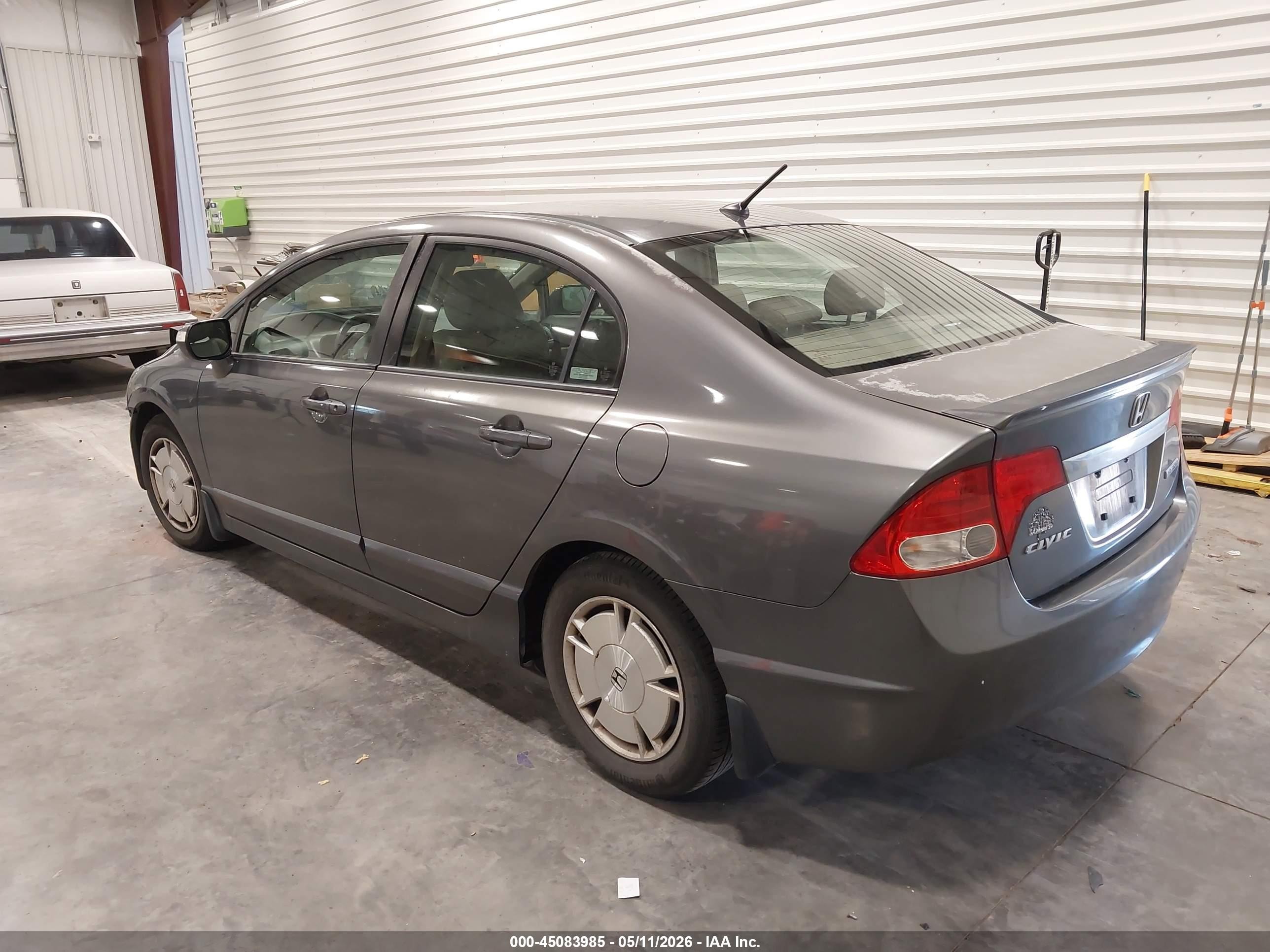 2010 Honda Civic Hybrid   Серый vin: JHMFA3F20AS005348