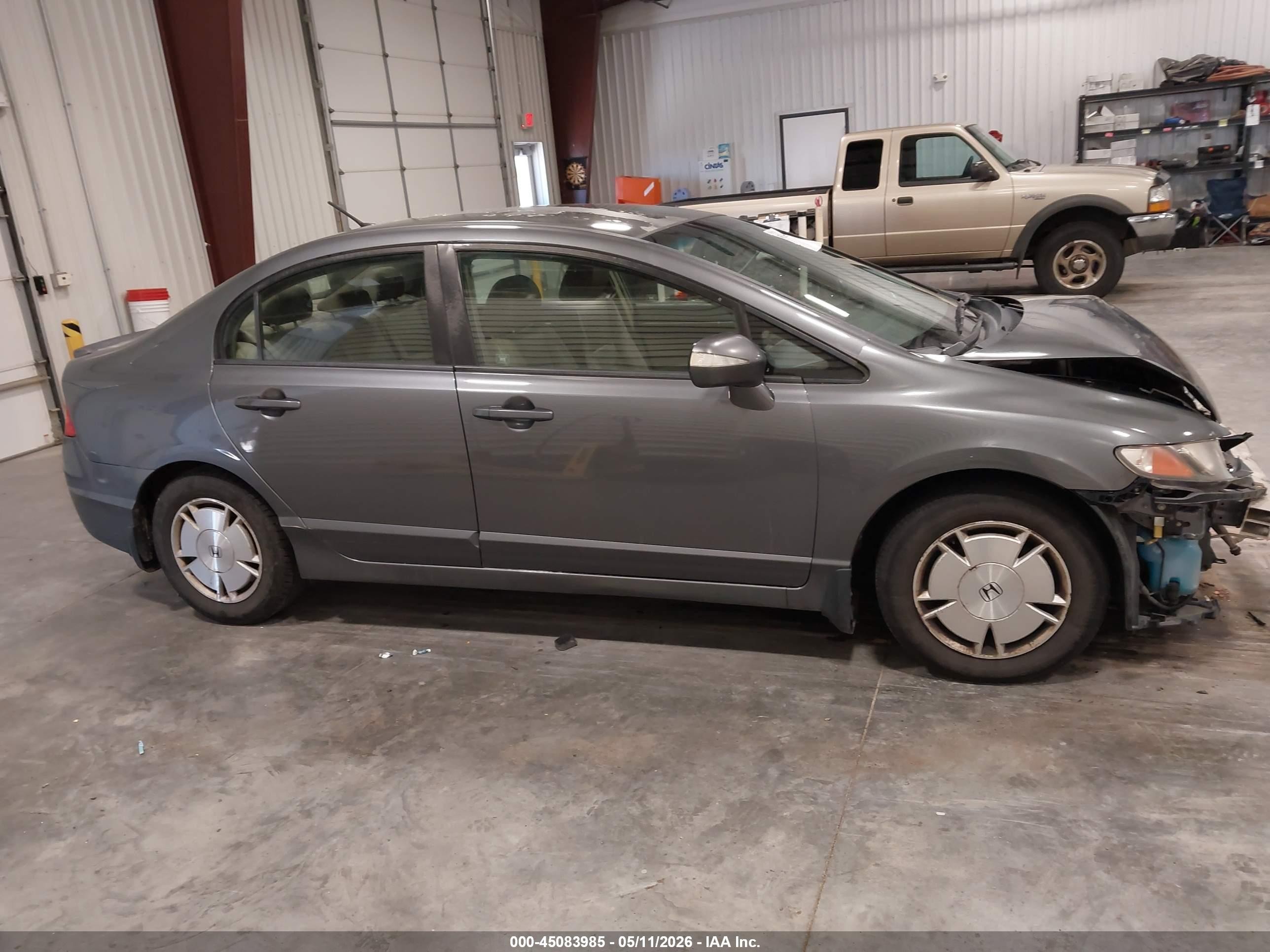 2010 Honda Civic Hybrid   Серый vin: JHMFA3F20AS005348