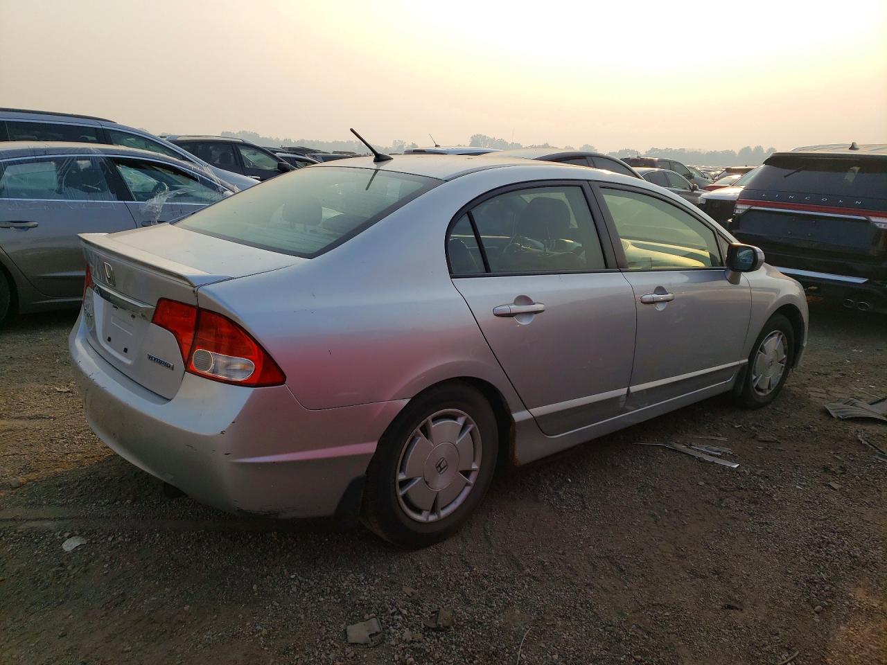 2010 Honda Civic Hybrid Серебряный vin: JHMFA3F20AS006600