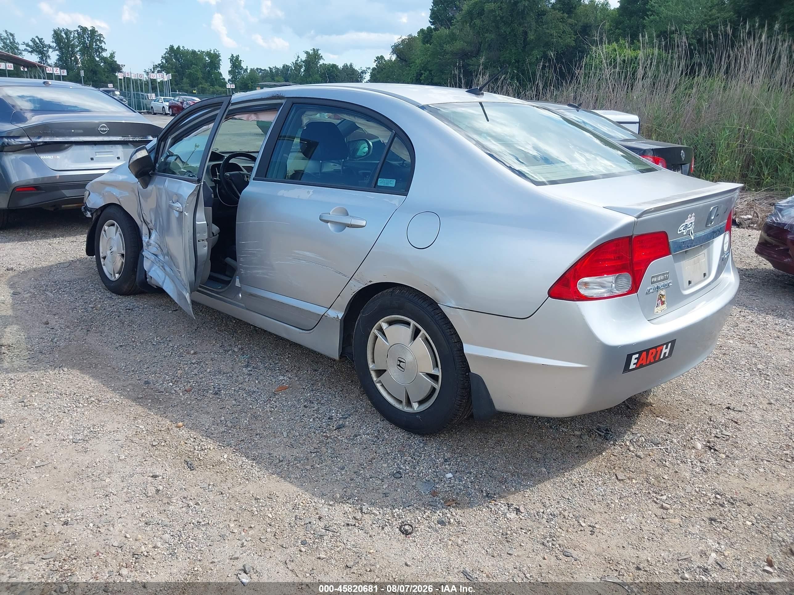 2010 Honda Civic Hybrid   Silver vin: JHMFA3F22AS003830