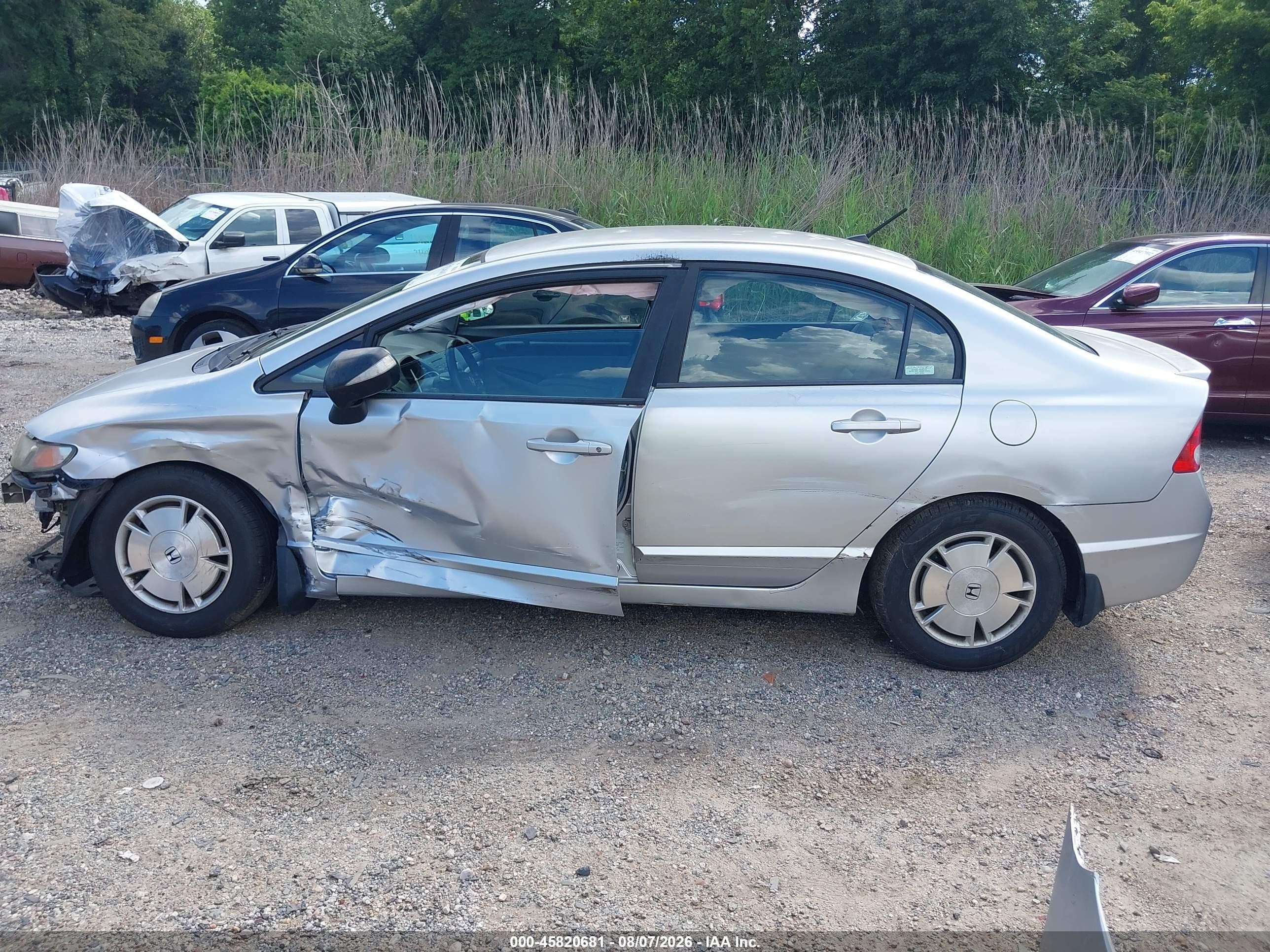 2010 Honda Civic Hybrid   Silver vin: JHMFA3F22AS003830