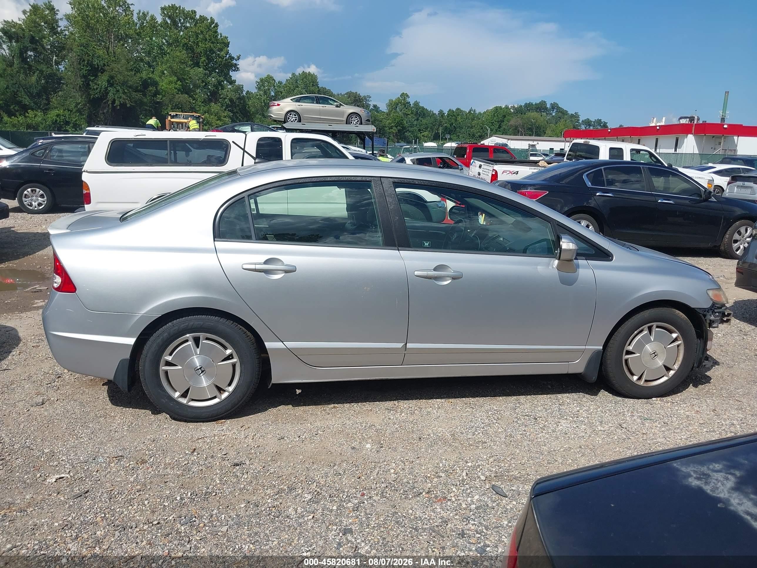 2010 Honda Civic Hybrid   Silver vin: JHMFA3F22AS003830