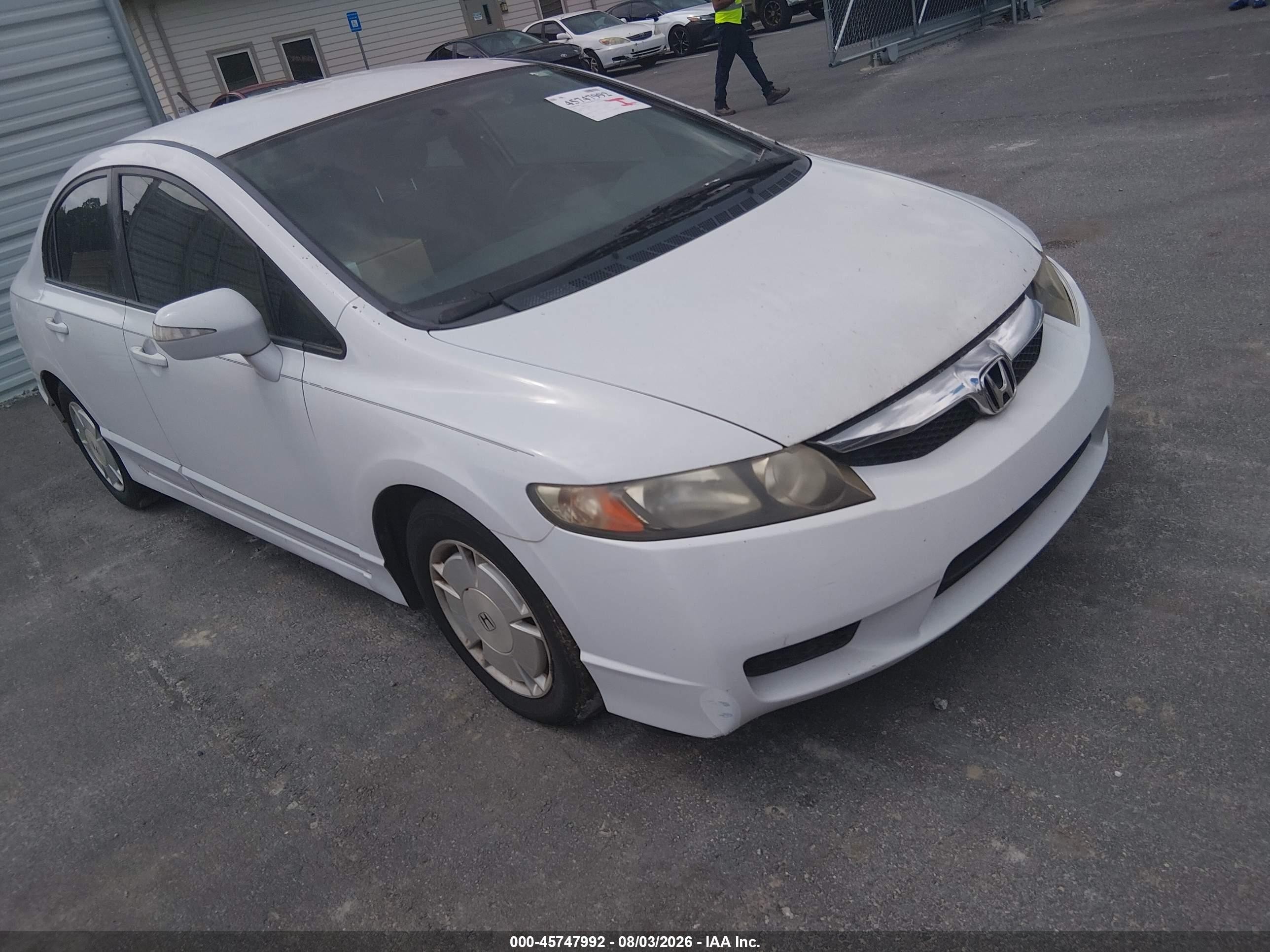 2010 Honda Civic Hybrid   White vin: JHMFA3F22AS006890