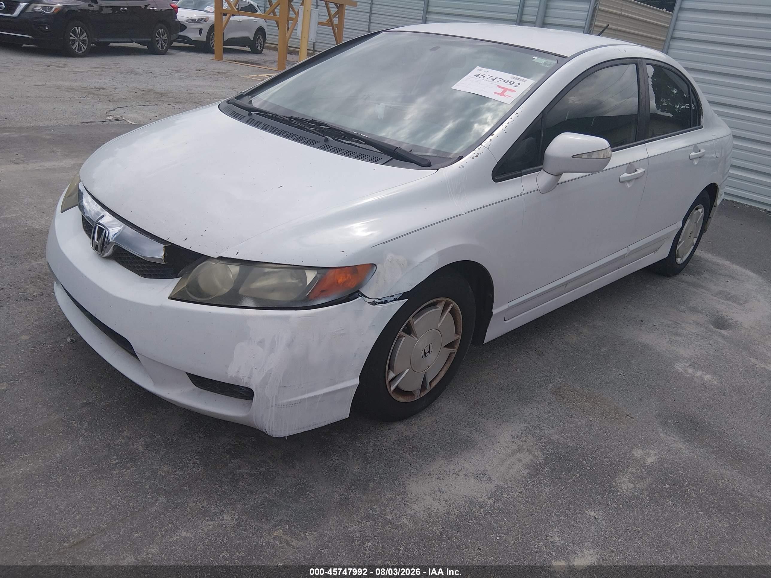 2010 Honda Civic Hybrid   White vin: JHMFA3F22AS006890