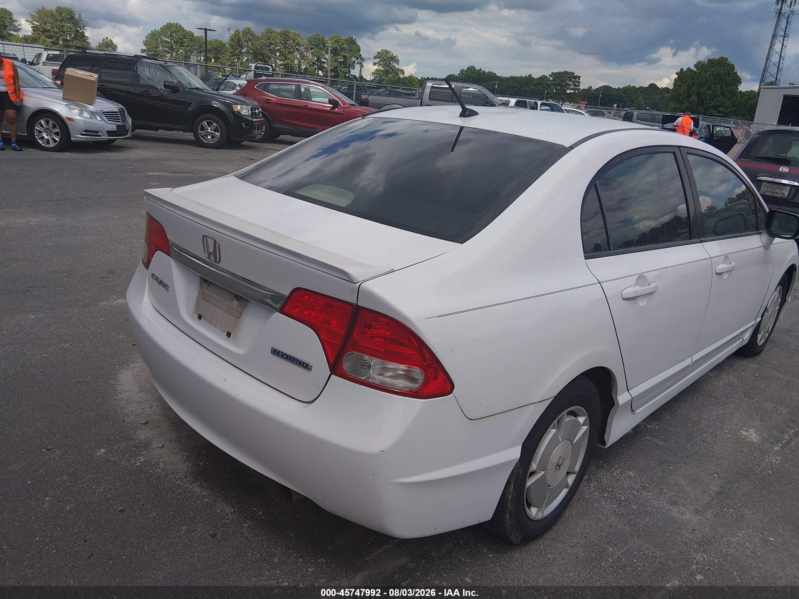 2010 Honda Civic Hybrid   White vin: JHMFA3F22AS006890