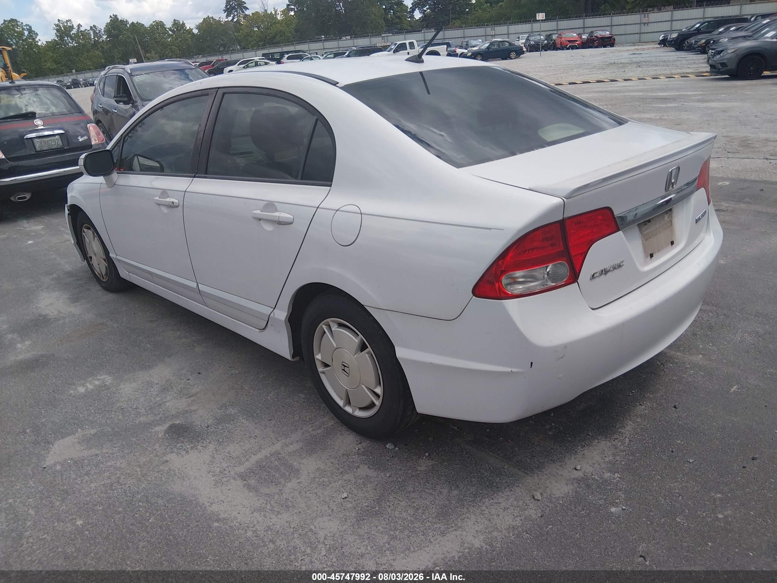 2010 Honda Civic Hybrid   White vin: JHMFA3F22AS006890