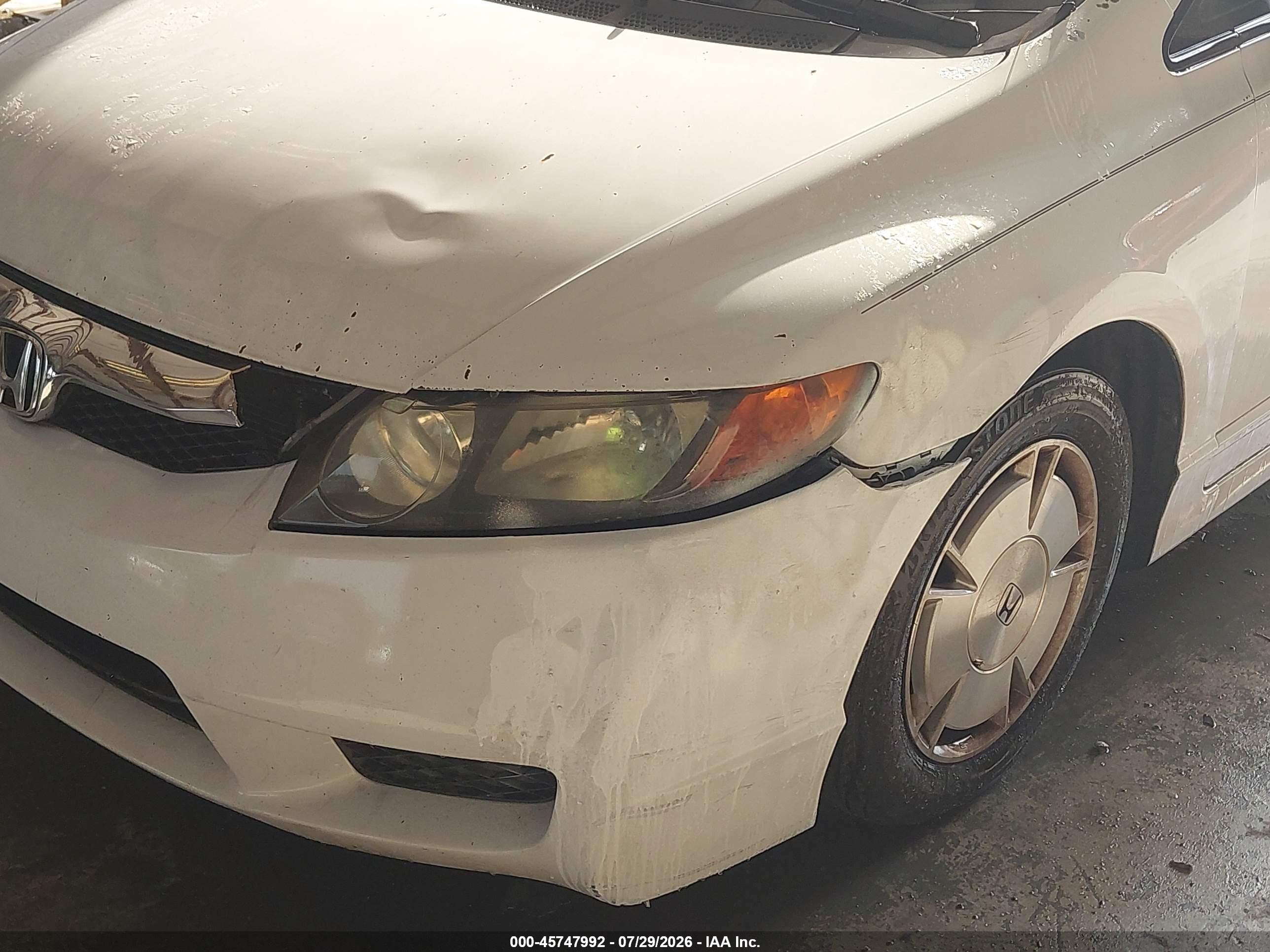 2010 Honda Civic Hybrid   White vin: JHMFA3F22AS006890