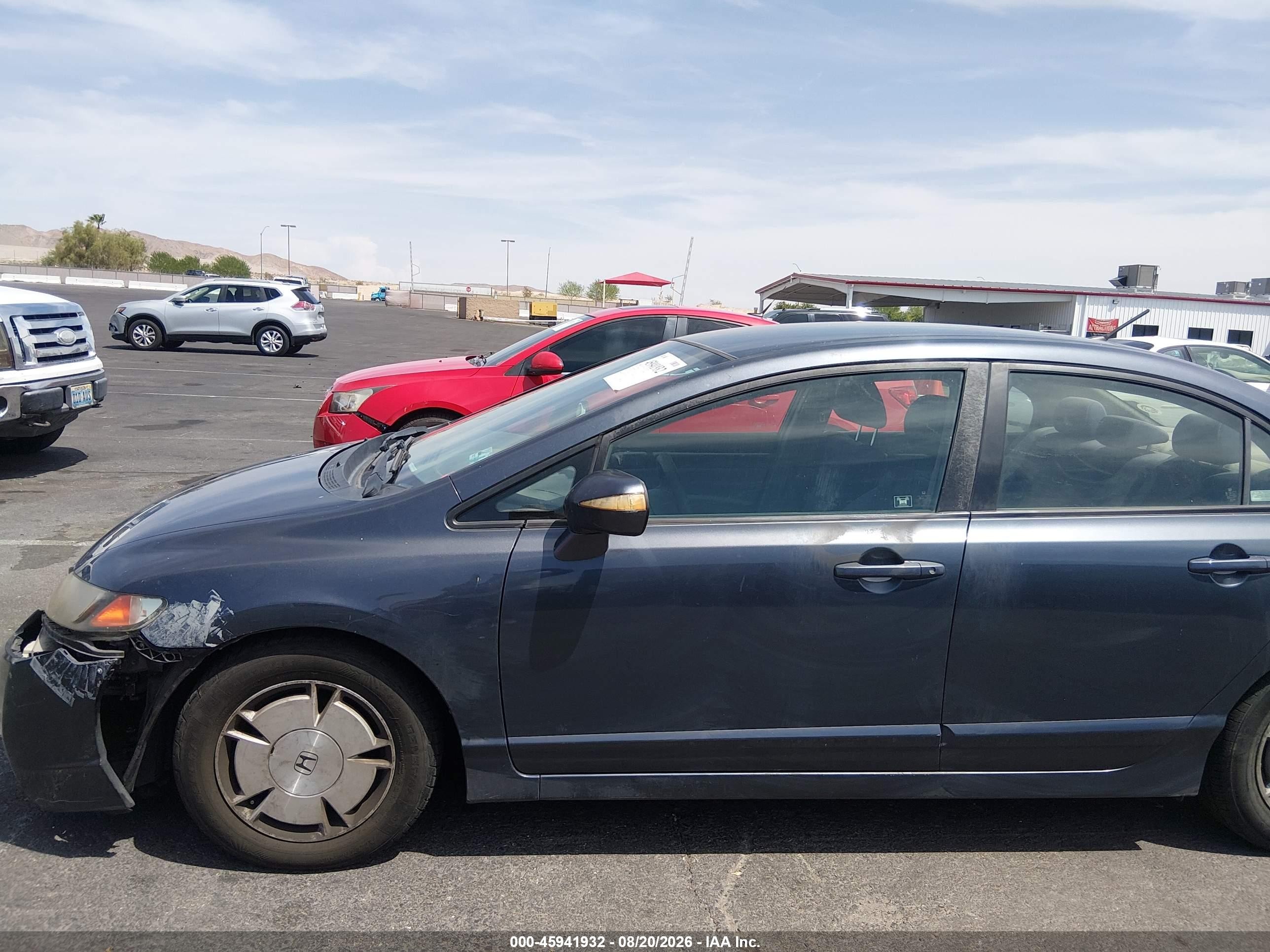 2010 Honda Civic Hybrid   Blue vin: JHMFA3F25AS001327
